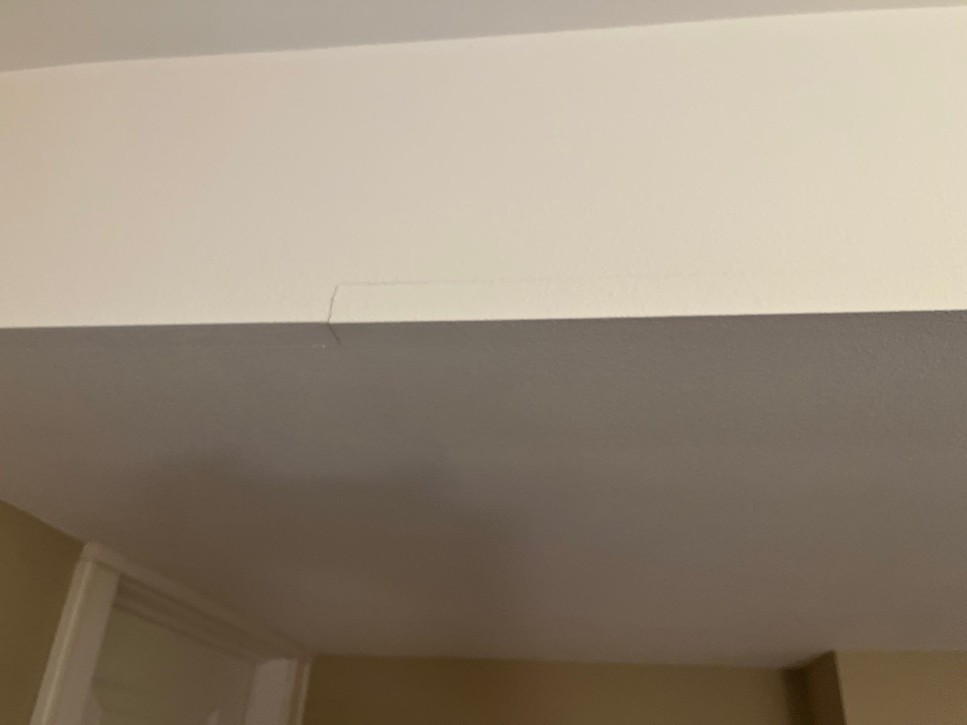 Sioux Falls Interior Painting with Custom Wainscoting and Decorative Wallpaper by Select Painting, Coatings & Garage Cabinets