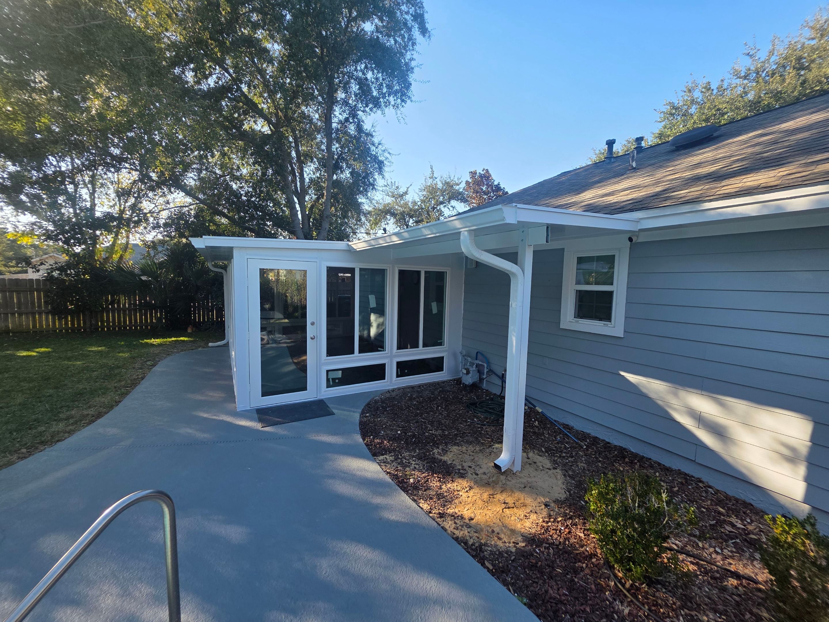 Patio Cover to Glass Room in Mary Esther, FL by Titan Sunrooms