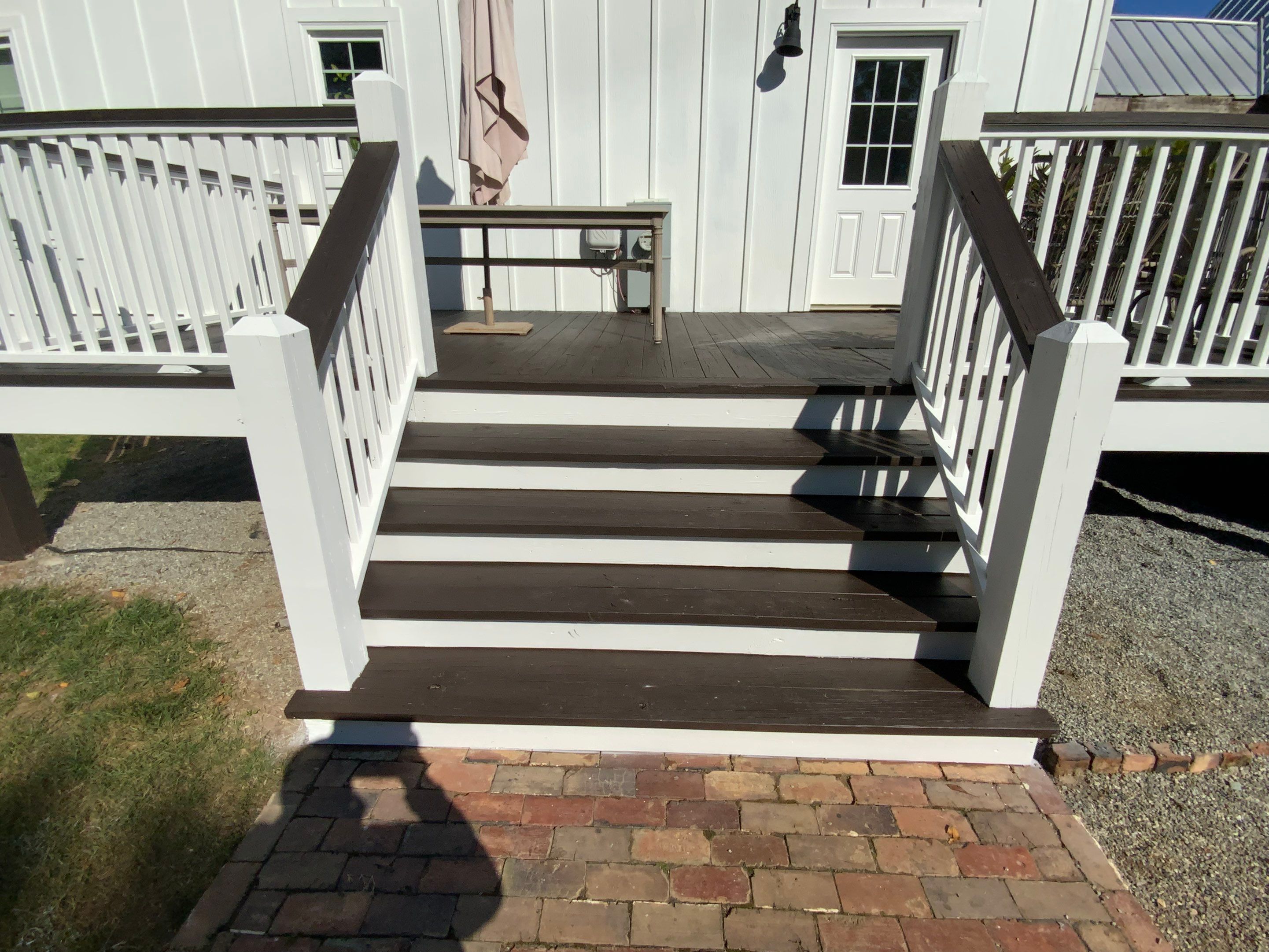 Exterior Trim Painting and Dark Deck Staining in Acworth by Swift Home Renovations