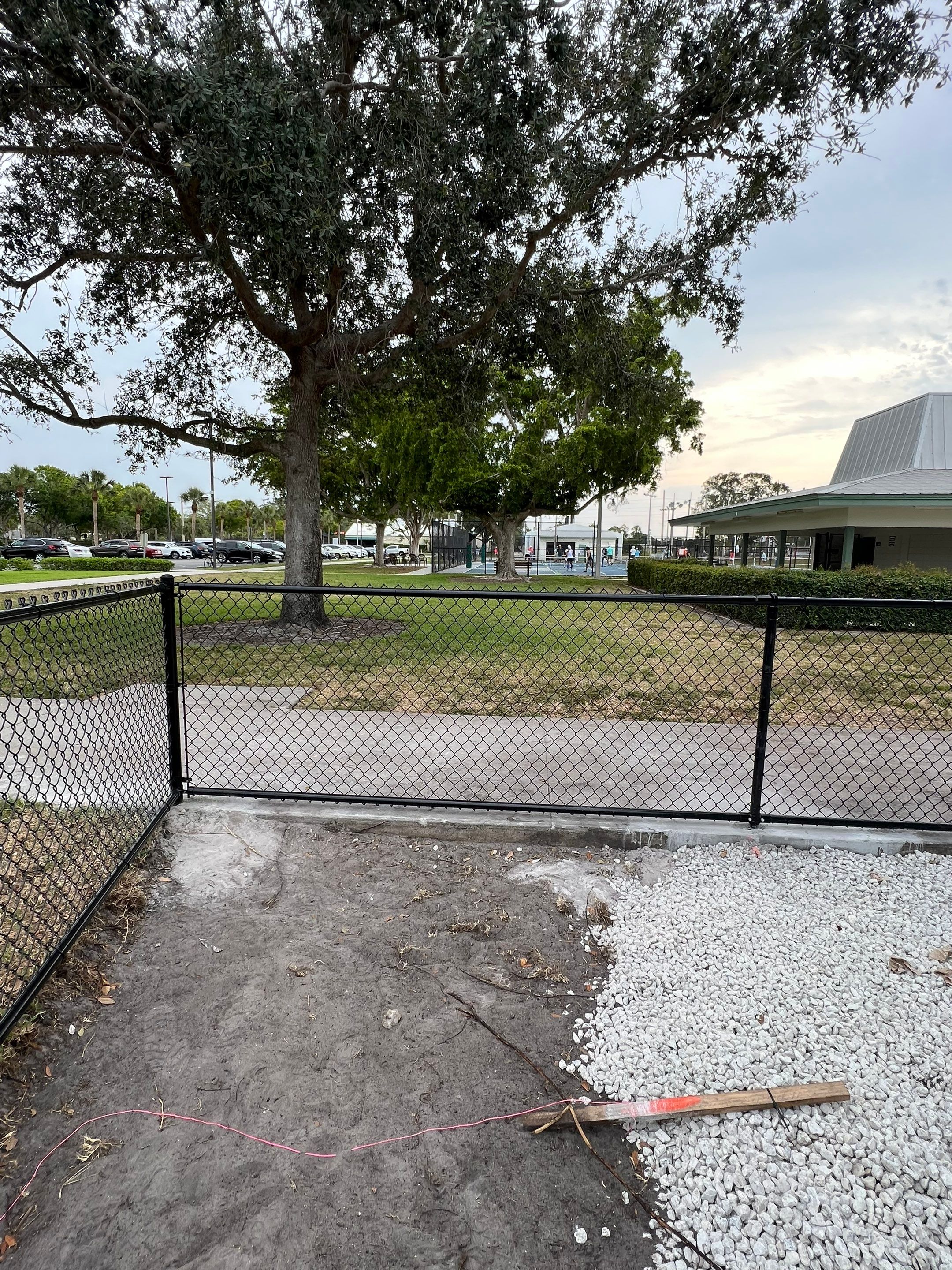 Vinyl Coated Chain-link fence for the City of Naples around Fleischmann Park Playground.  by Asap fence and gates, LLC