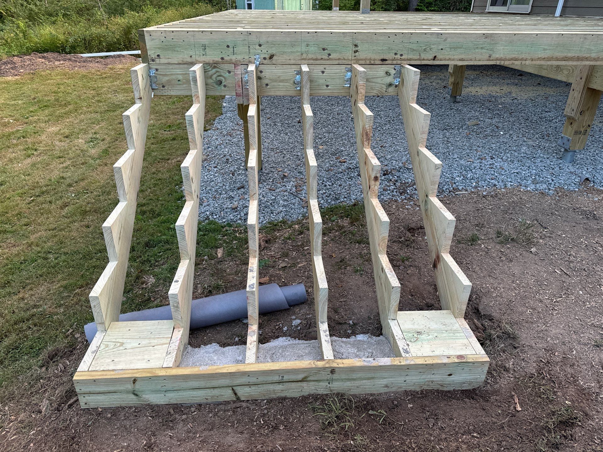 New Deck using Trex Tiki Torch  by deck guardian