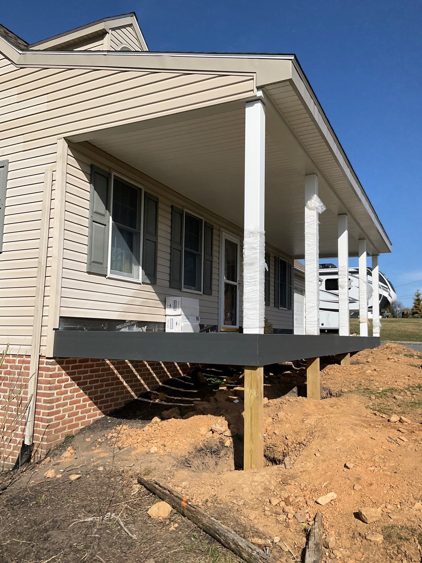 Custom Porch Roof Addition and Siding Renovation in Myerstown, PA by Esh Builders