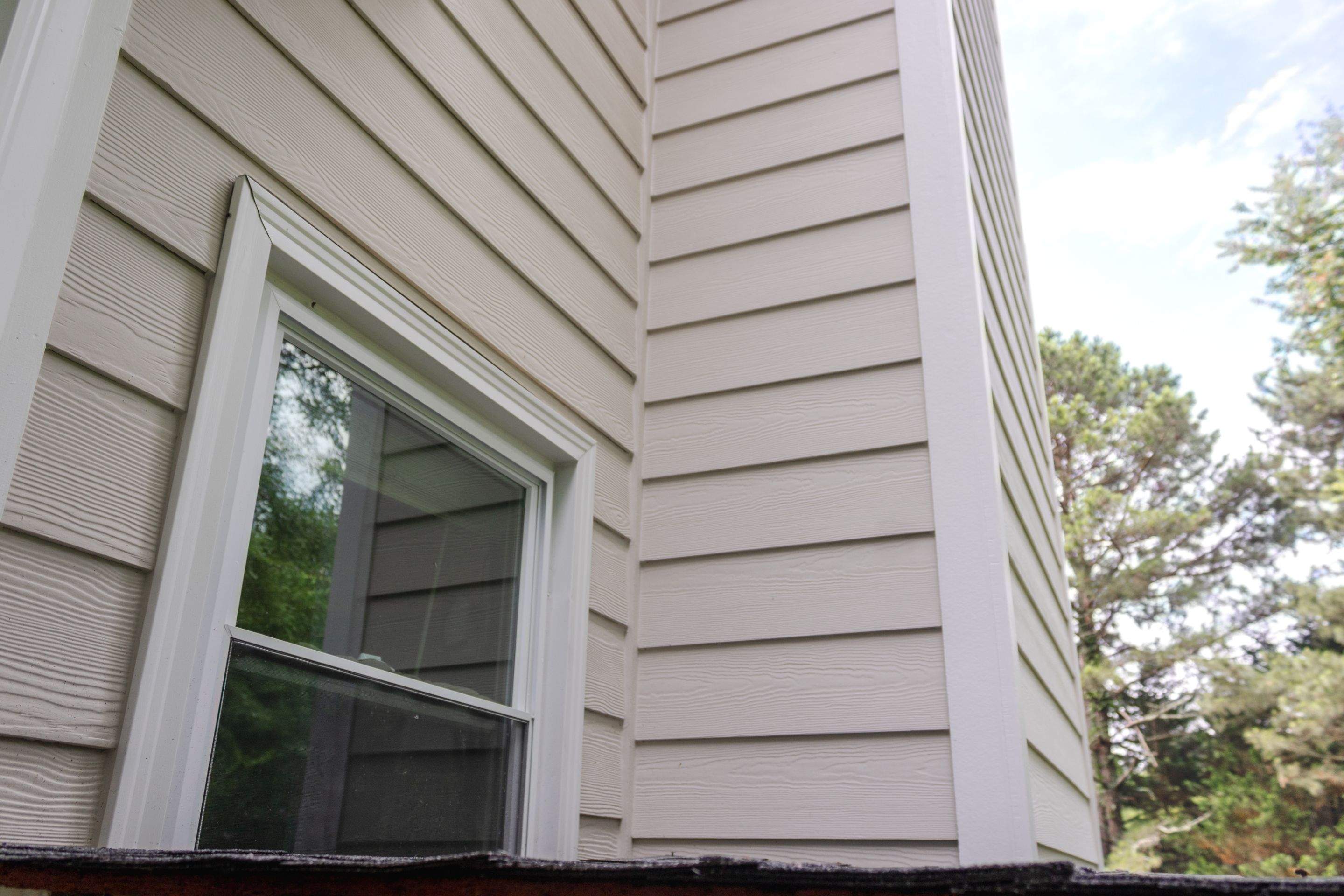 Marietta, GA Chimney Siding, Fascia, and Soffit Replacement using James Hardie Lap Siding, Hardie Trim, and Hardie Panel by Nelson Exteriors 