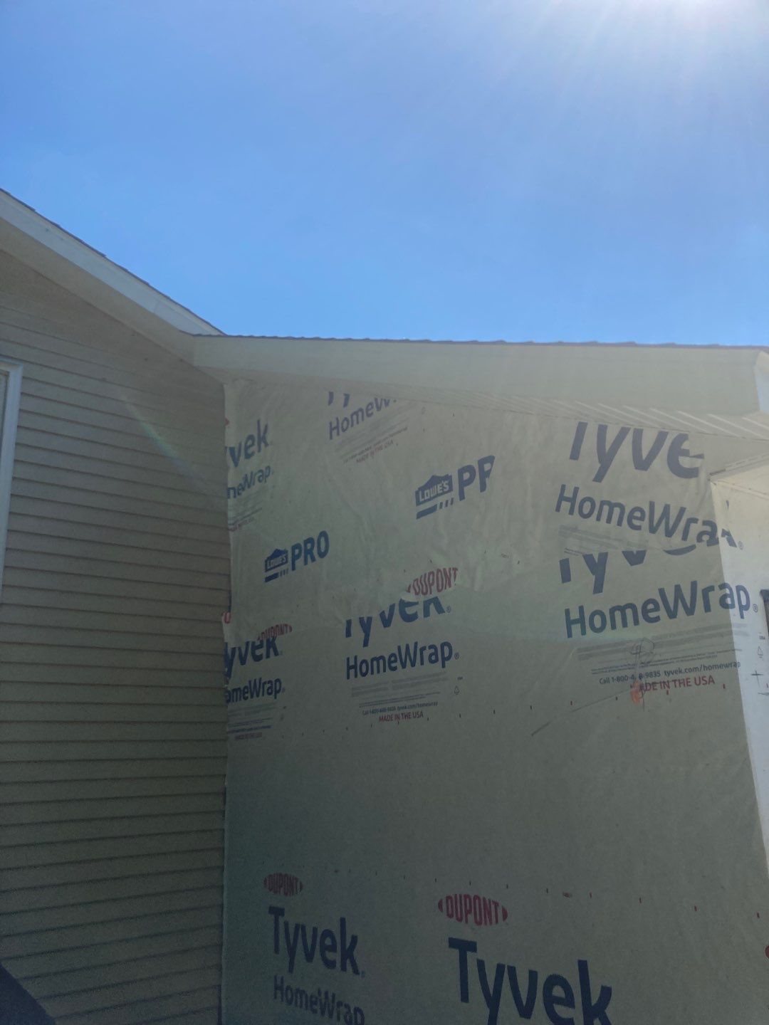 Gutter Installation using 5" Seamless Aluminum Gutters by Absolute Roofing and Construction