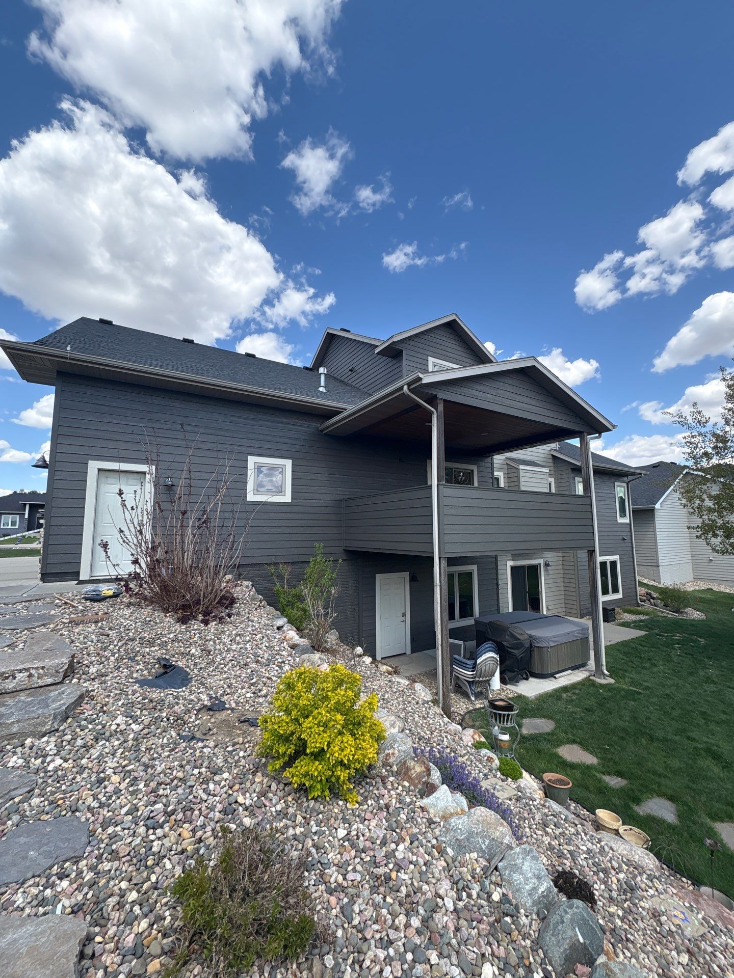Residential Exterior Painting and Color Update in Sioux Falls by Select Painting, Coatings & Garage Cabinets