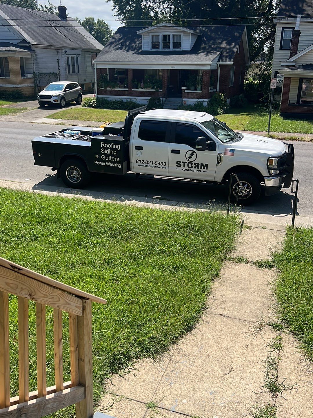 Rental Property Restoration, siding, flooring, gutters, landscaping by Storm Contracting 