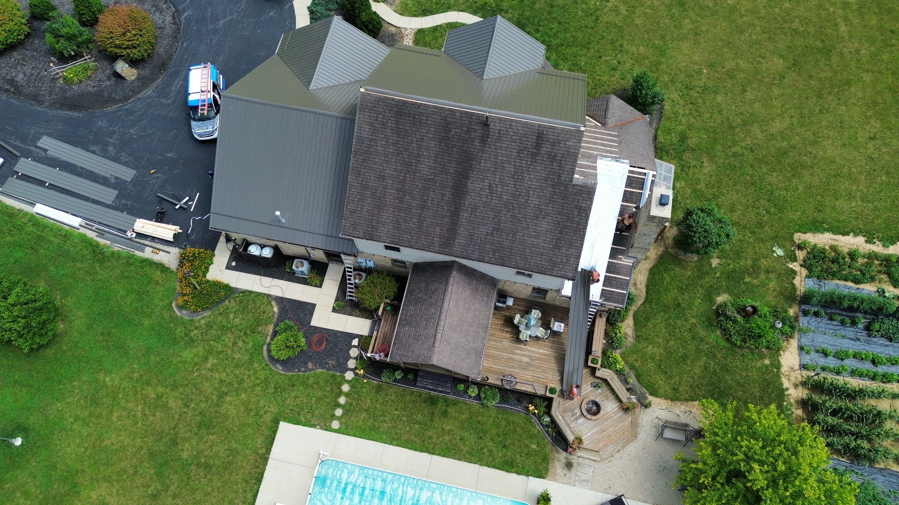 Residential Roofing Installation using Performance Panel Metal - Burnished Slate by RoofX 