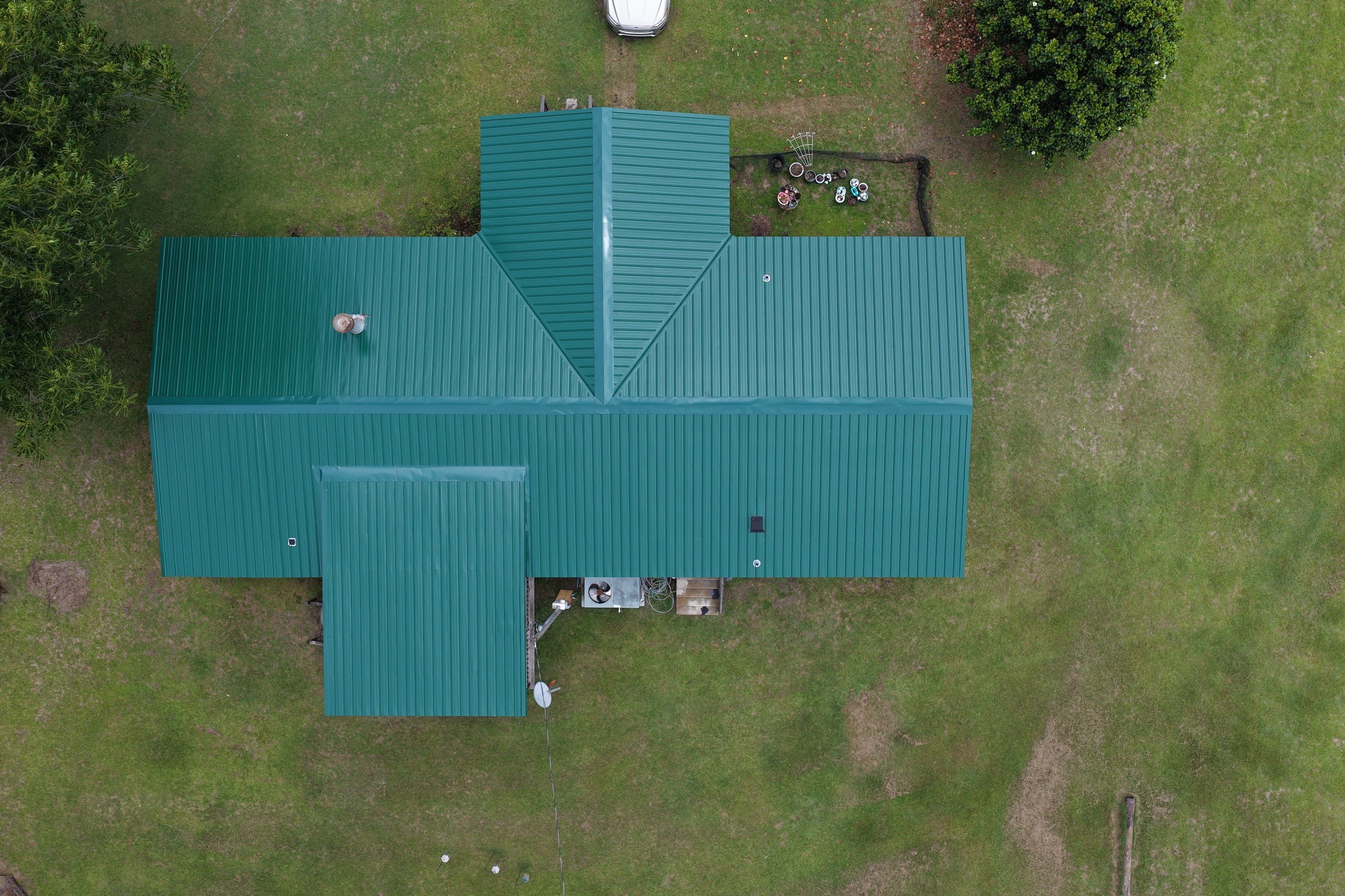 Standing Seam Green Metal Roof Installation in Sumter by Exterior Genie, LLC