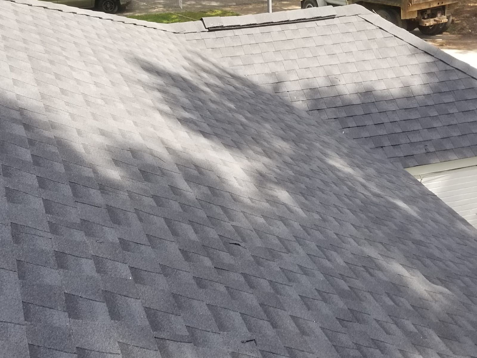 Residential Roofing Installation using Roof Replacement by American Roofing & Construction LLC