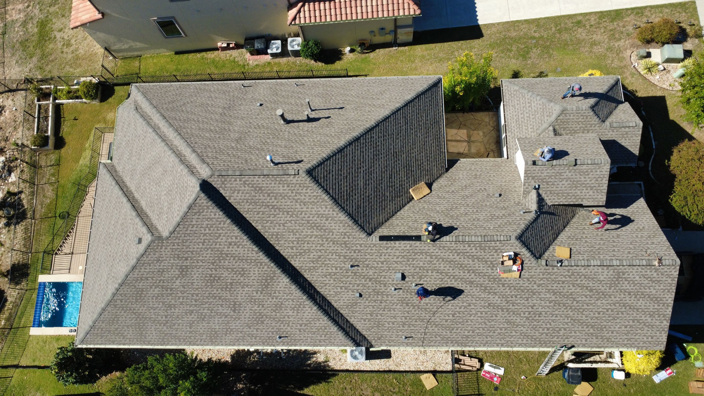 Residential Roof Replacement using GAF - Armorshield ll - Weathered Wood by Action Exteriors Austin