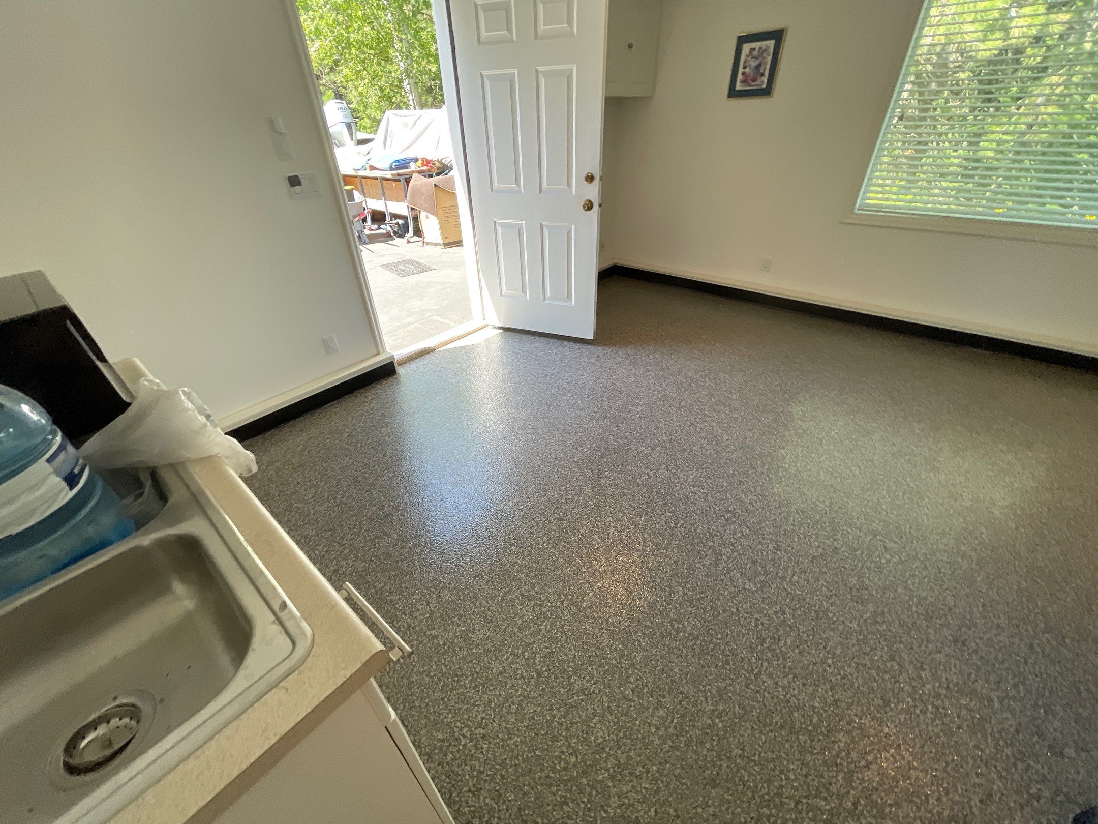 Garage Transformation using Echo 1/4" Chip by Croc Coatings, LLC