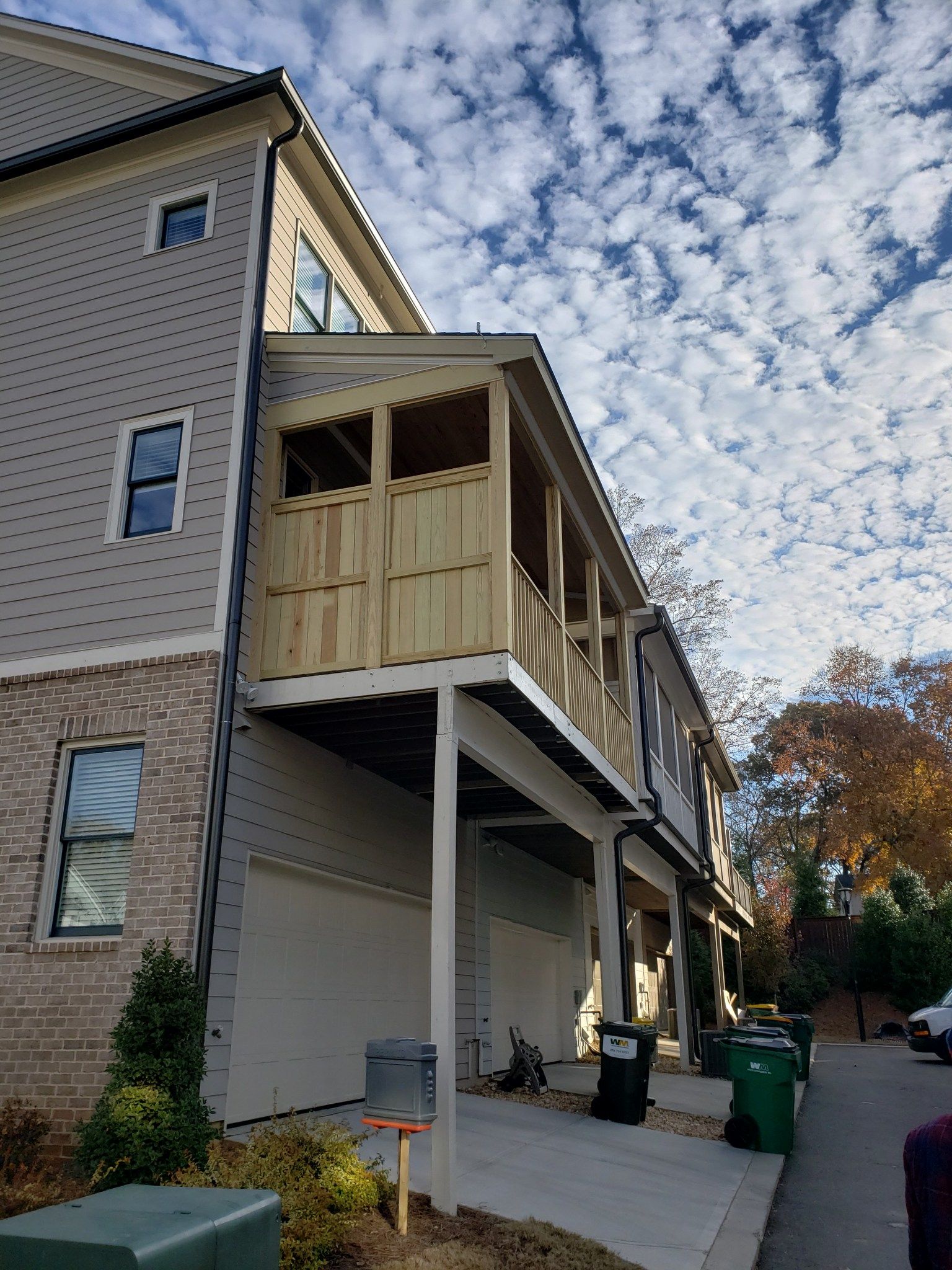 Screened Porch Conversion and Balcony Upgrade in Woodstock by Swift Home Renovations 