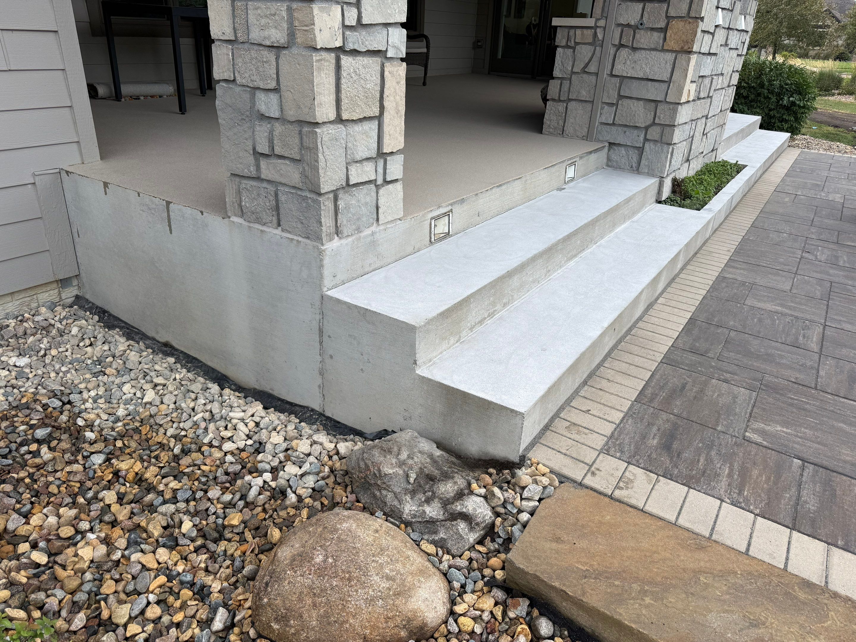 Sioux Falls Patio Concrete Coating and Porch Step Repair by Select Painting, Coatings & Garage Cabinets