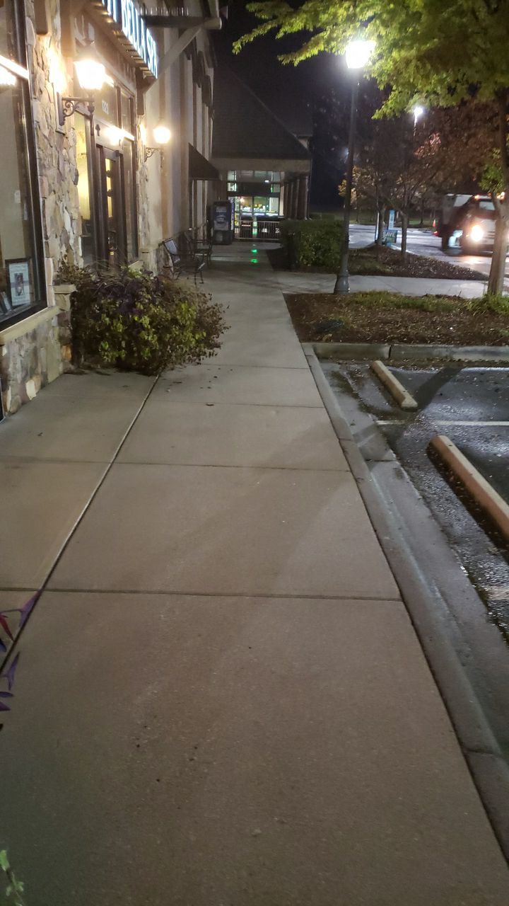 contrete cleaning using cleaner by Power Wash Masters LLC