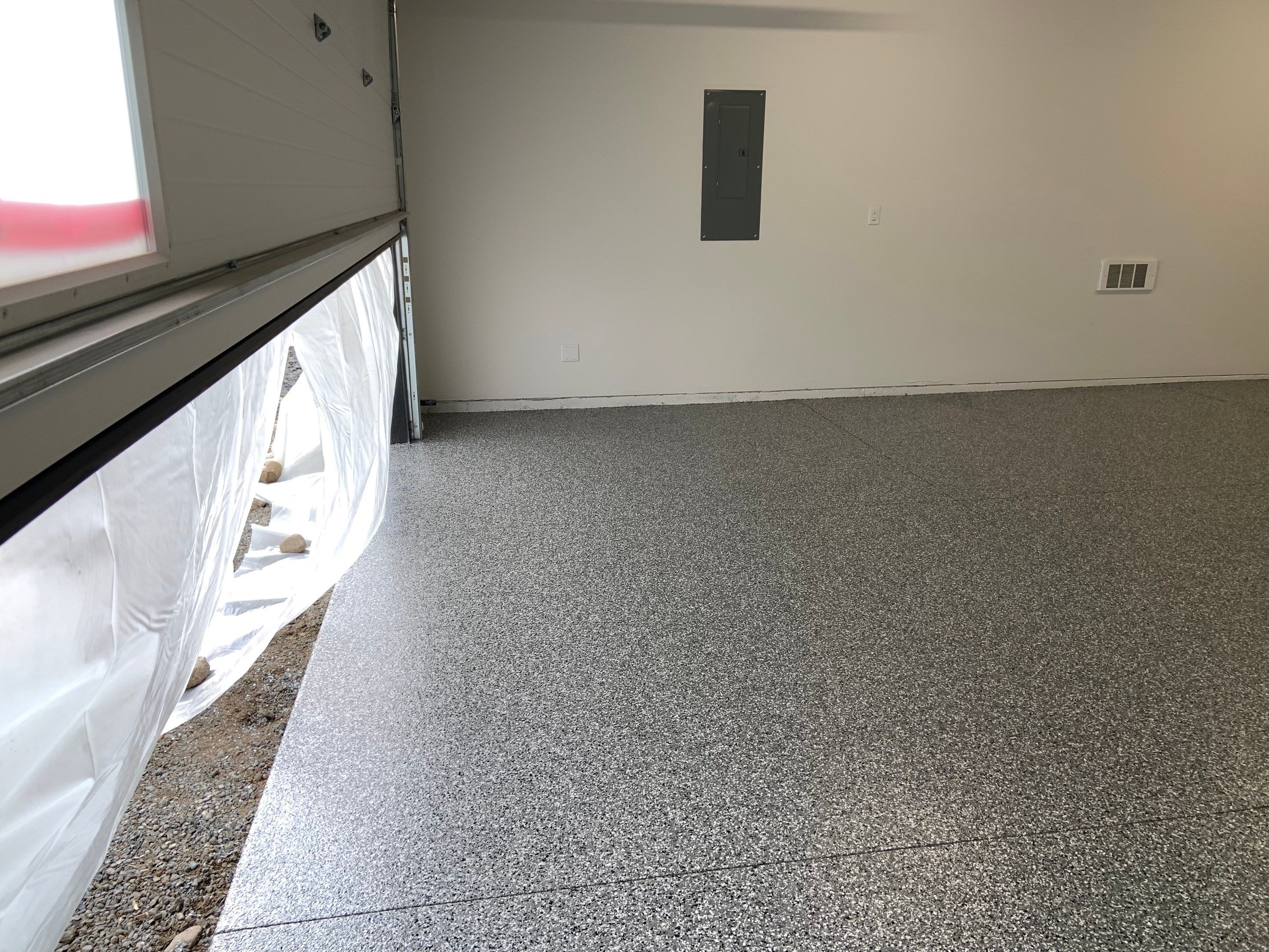 Garage Transformation using Smoke by Croc Coatings, LLC