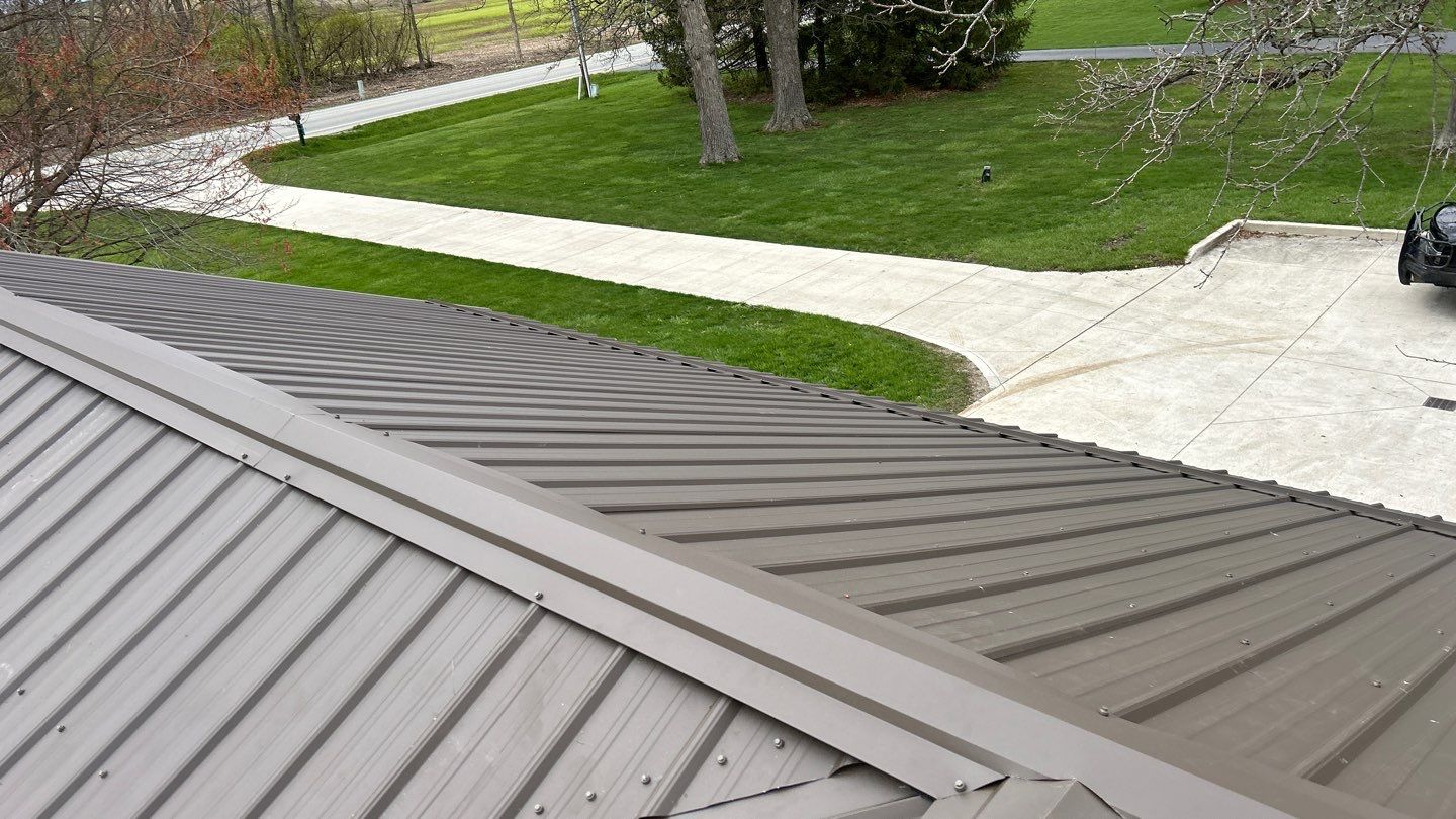 Residential Roofing Installation using Performance Panel Metal - Crinkle Bronze by RoofX 