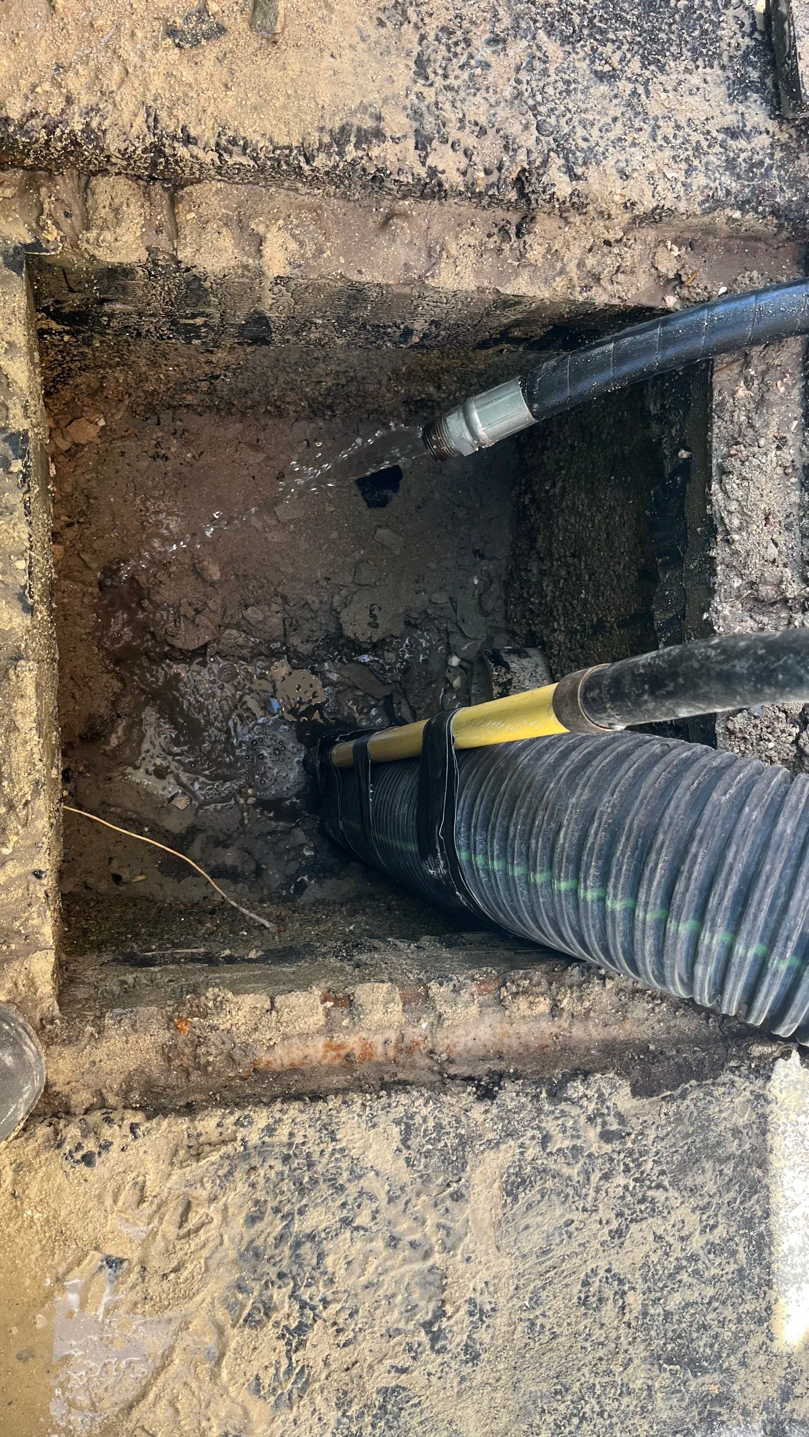 Condo Elevator Shaft Clean Out and Remove Bloackage in Storm Drain System by APS Power & Water