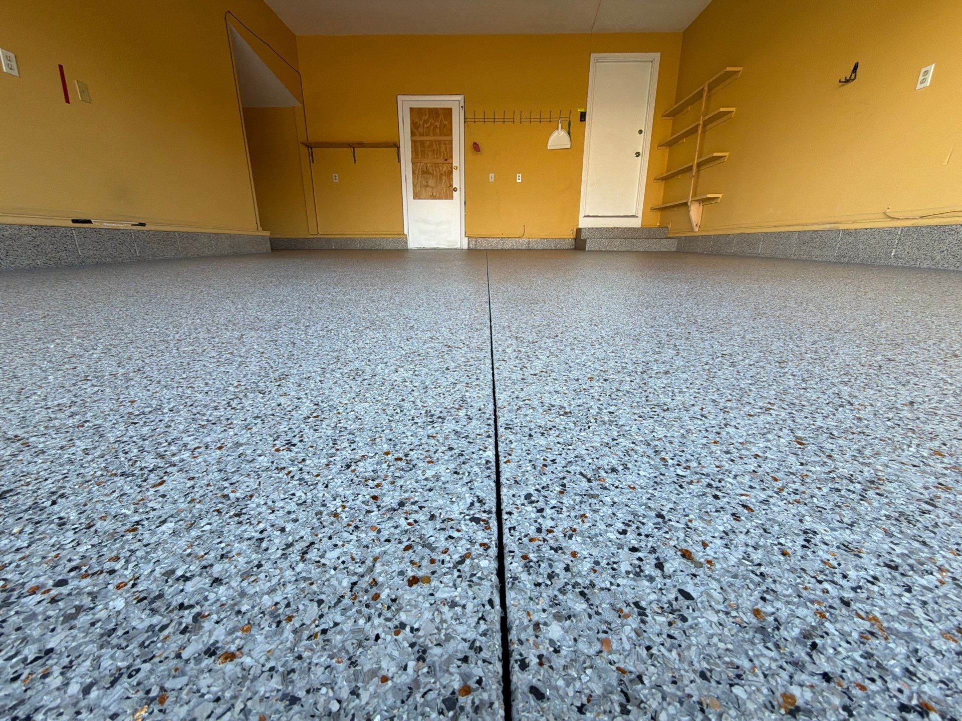 Vintage Goldmine Garage Coating by NG Masonry & Construction LLC