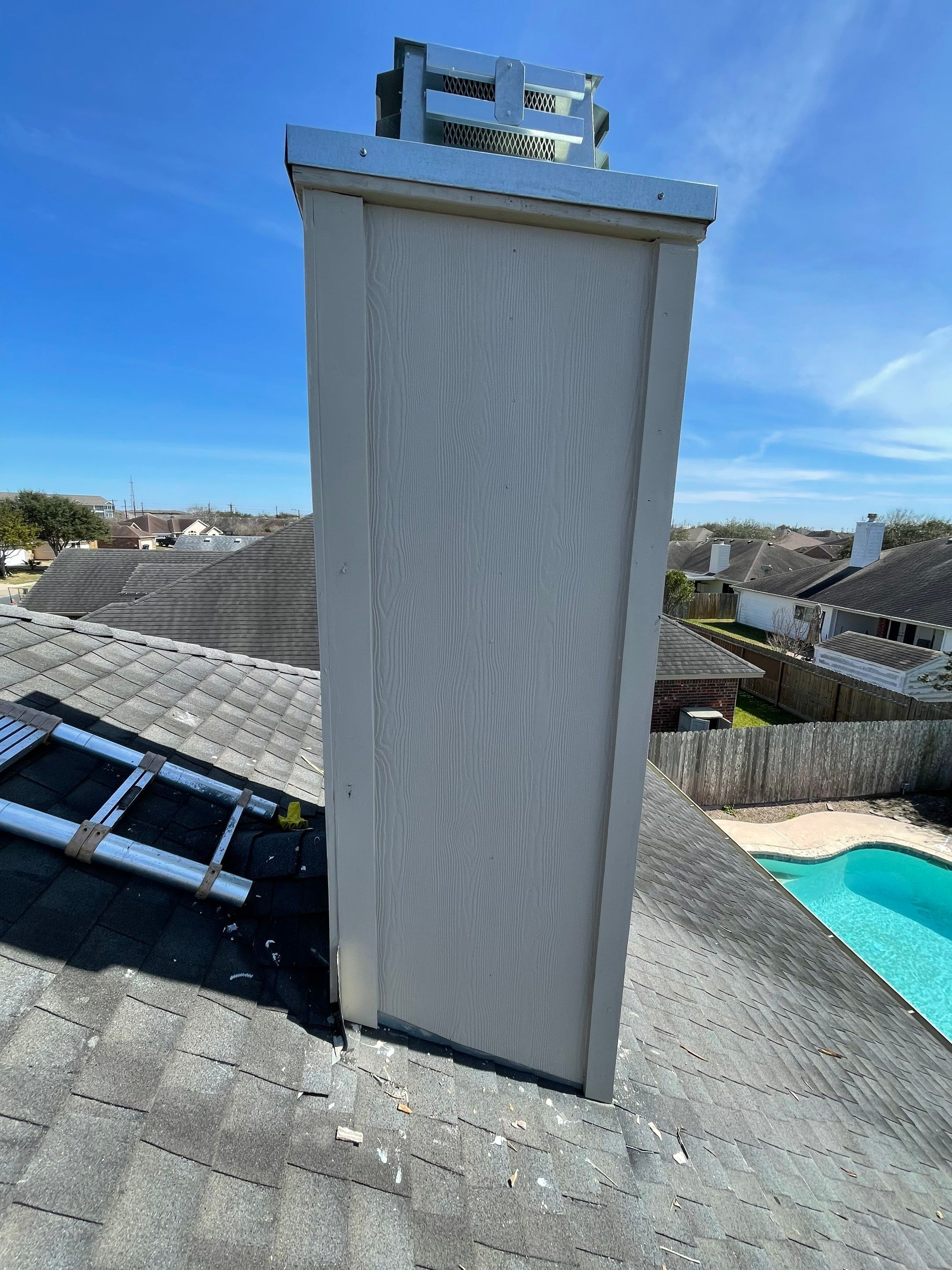 Residential Roofing Repair Replacing Chimney Cap by Lighthouse Roofing