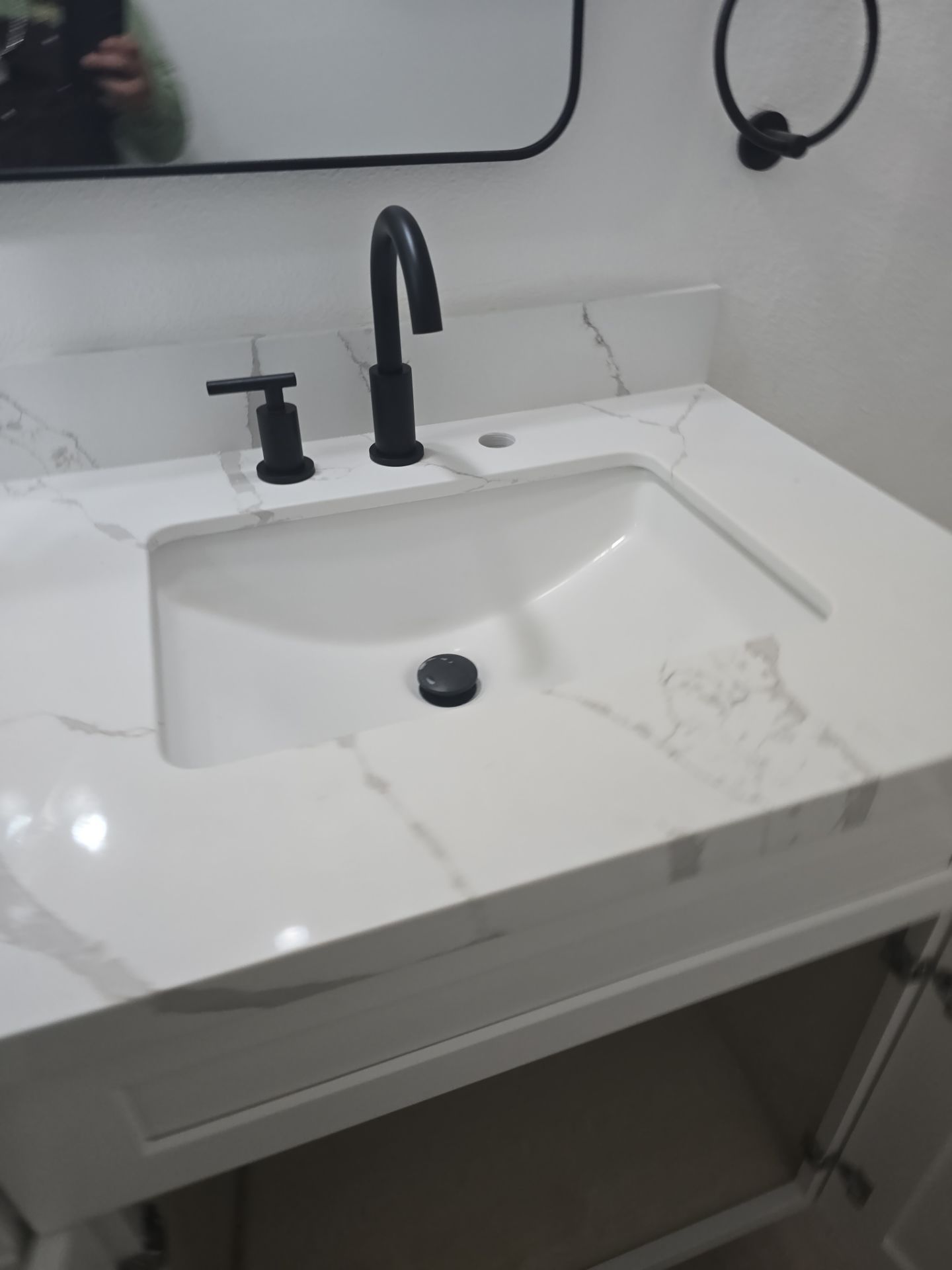 Scope of Work: Installation of Shower, Toilet, Plumbing, Kitchen Sink, and Fixtures by Us Plumbing 
