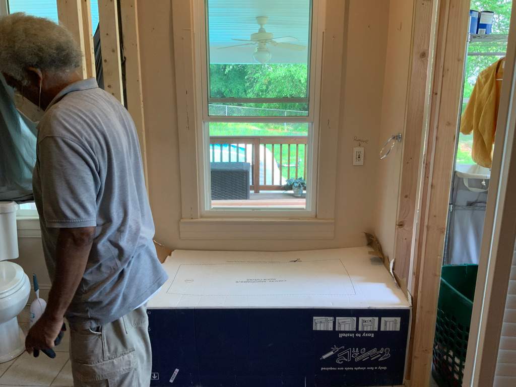 Bathroom Remodel using New Bathroom Tile and Tube by Alpha Design Services