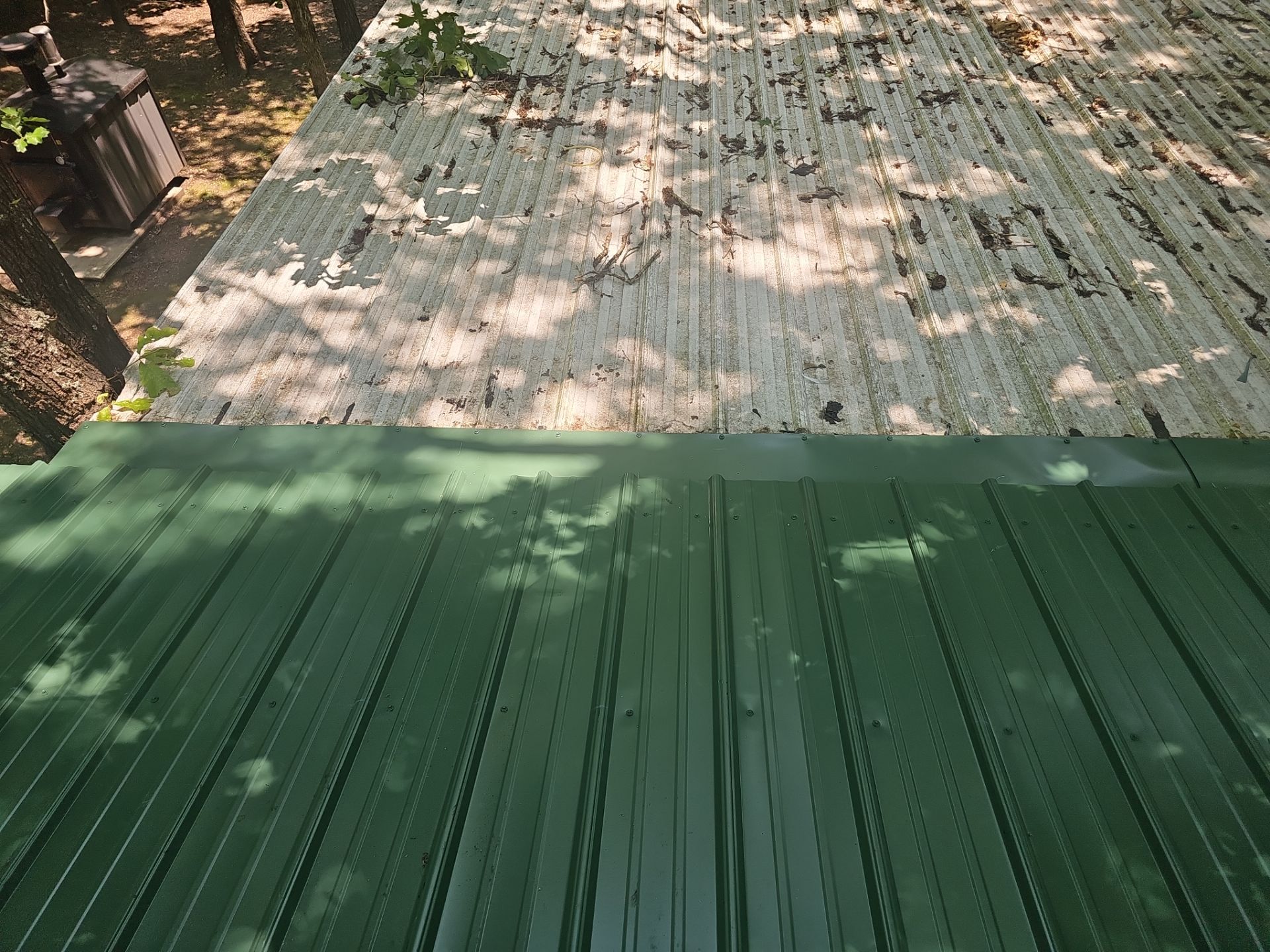 Residential Roofing Install - 26 Gauge G-Rib Metal - Color Evergreen  by Titan Commercial & Residential Roofing 