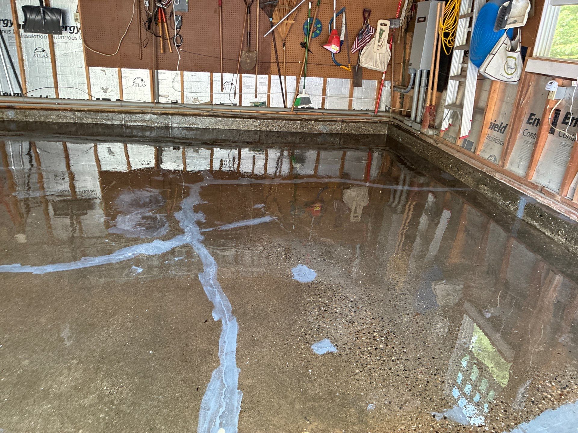 Concrete Floor Coating Using Feather Gray Color by DiGiorgi Roofing and Siding Inc