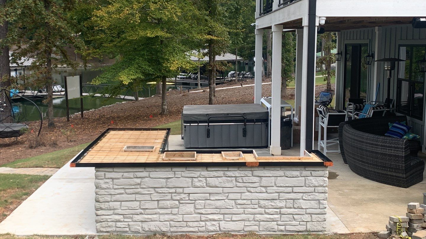 Outdoor Kitchen on Lake Keowee by Xtreme Concrete Services