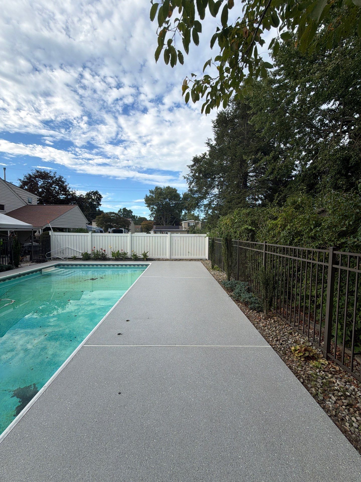 Blue Granite Pool Patio Concrete Coating in Lincoln Park by Spectrum Painting, LLC