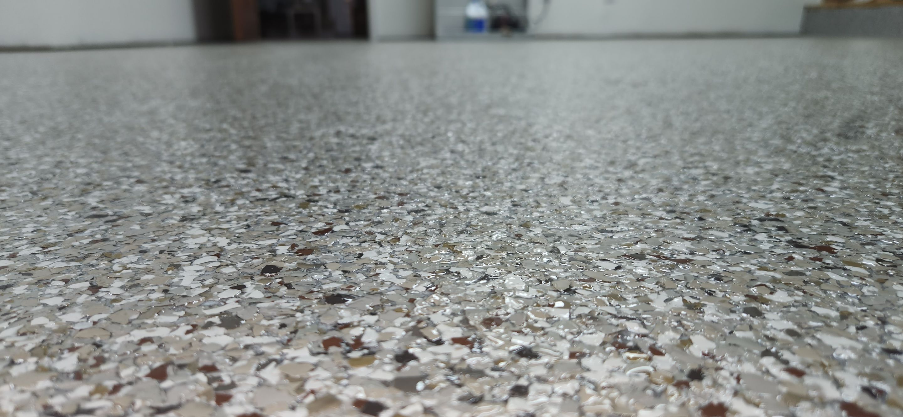 Front Porch and Garage using Creekbed by Elite Floor Solutions