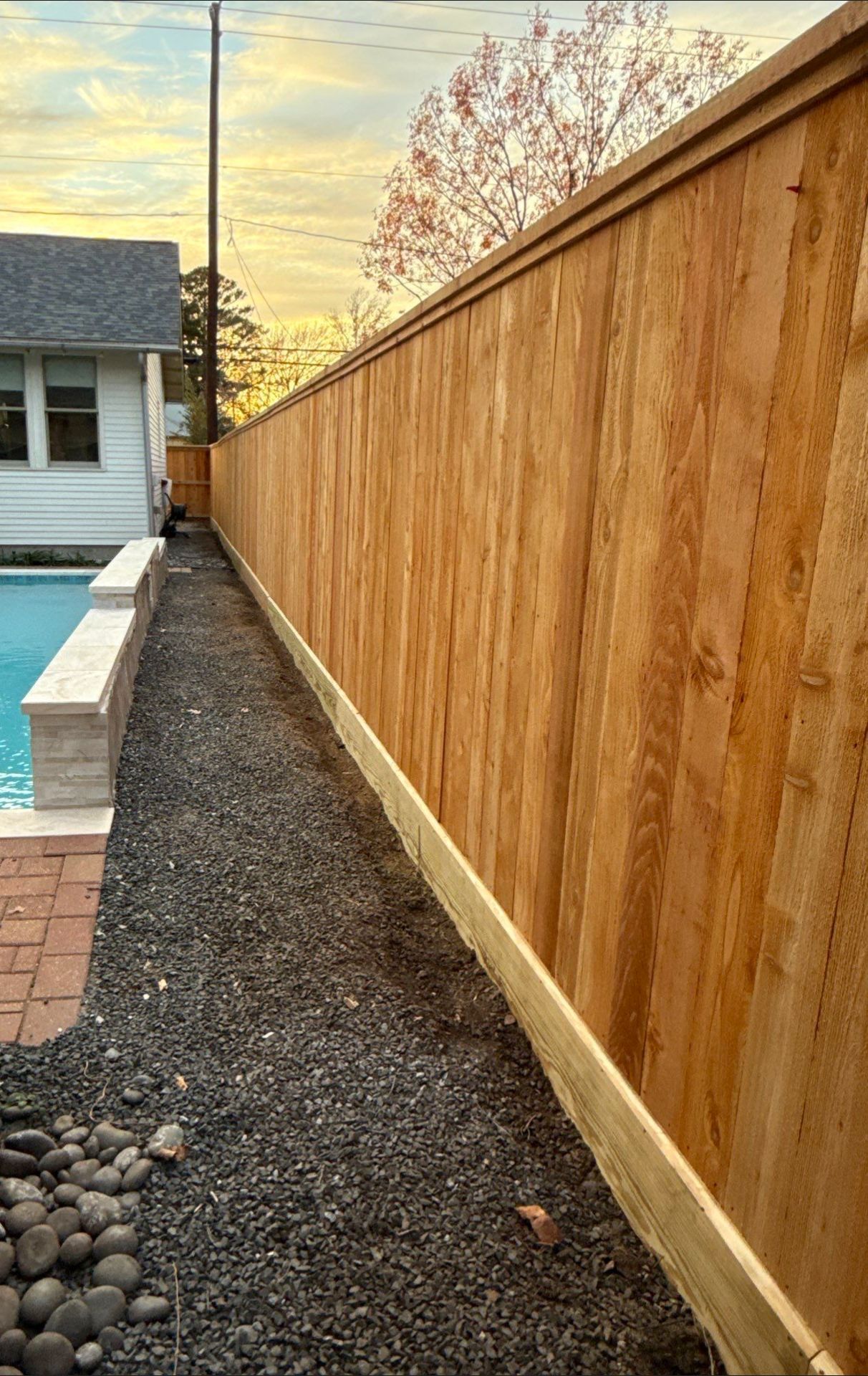 Durable Fence & Gate Installation with Premium Stain by Tim's Fences