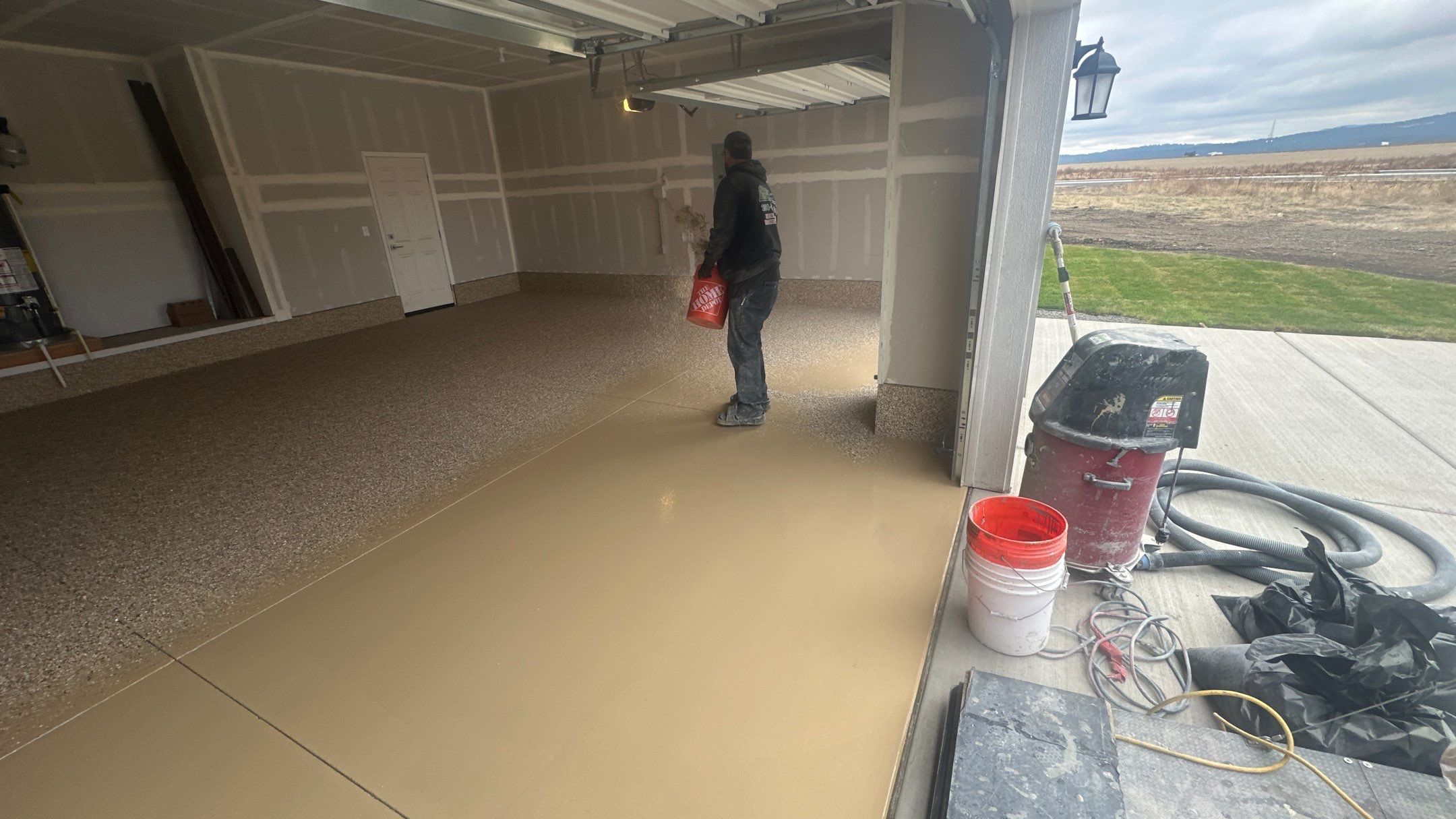 Garage Transformation using Sandstone by Croc Coatings, LLC
