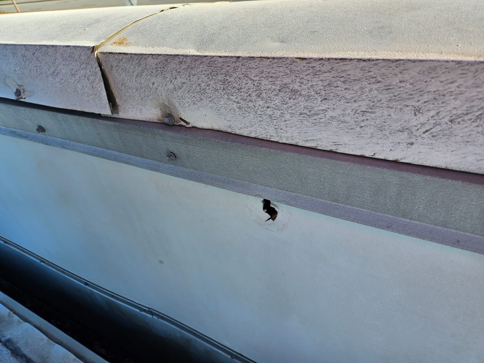 Commercial Roofing Repair using TPO and Metal Decking by Four Peaks Roofing
