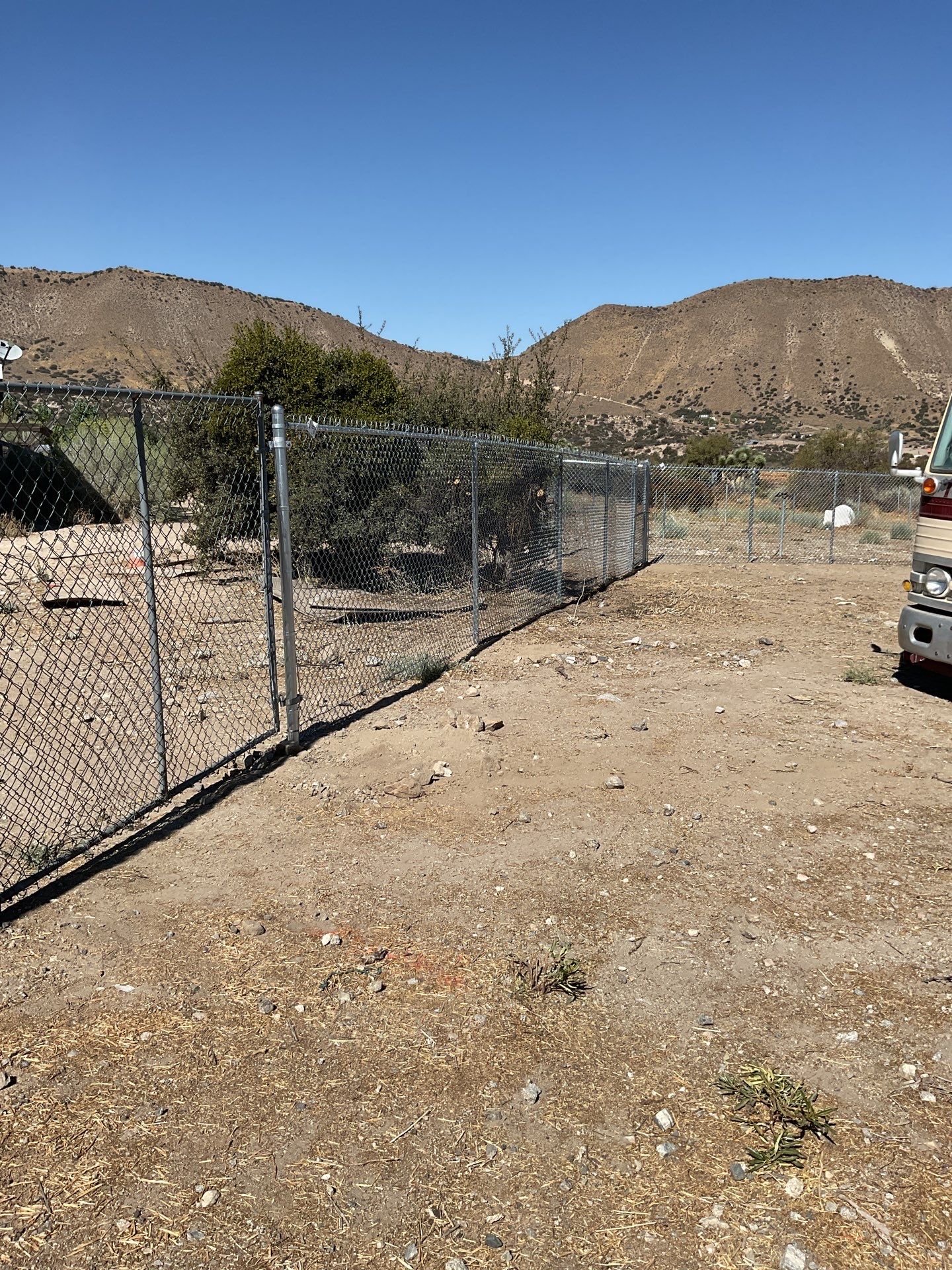 Fence Installation using chain -link by Fence Guys Inc.