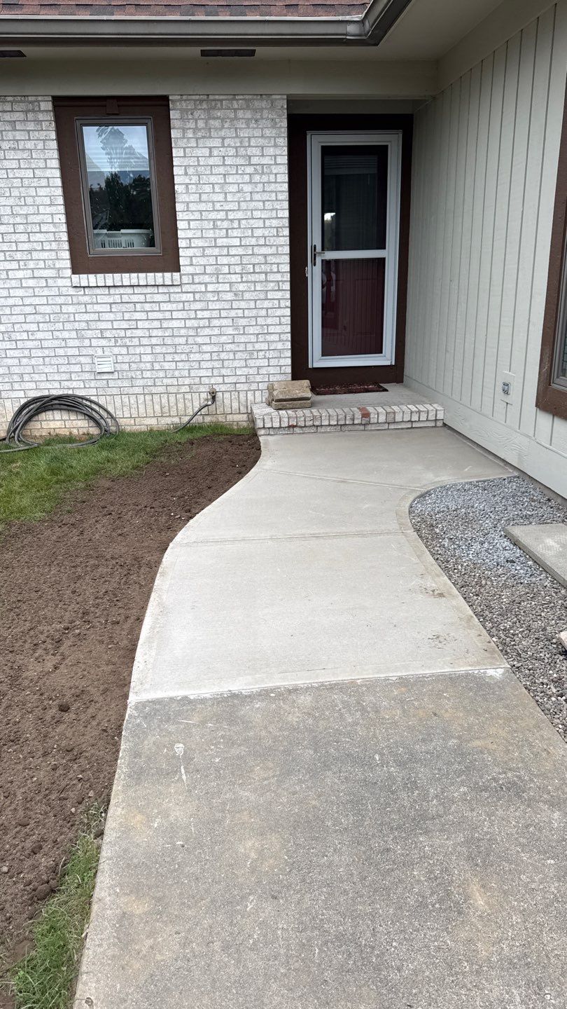 Broom finished concrete patio and walkways  by NG Masonry & Construction LLC