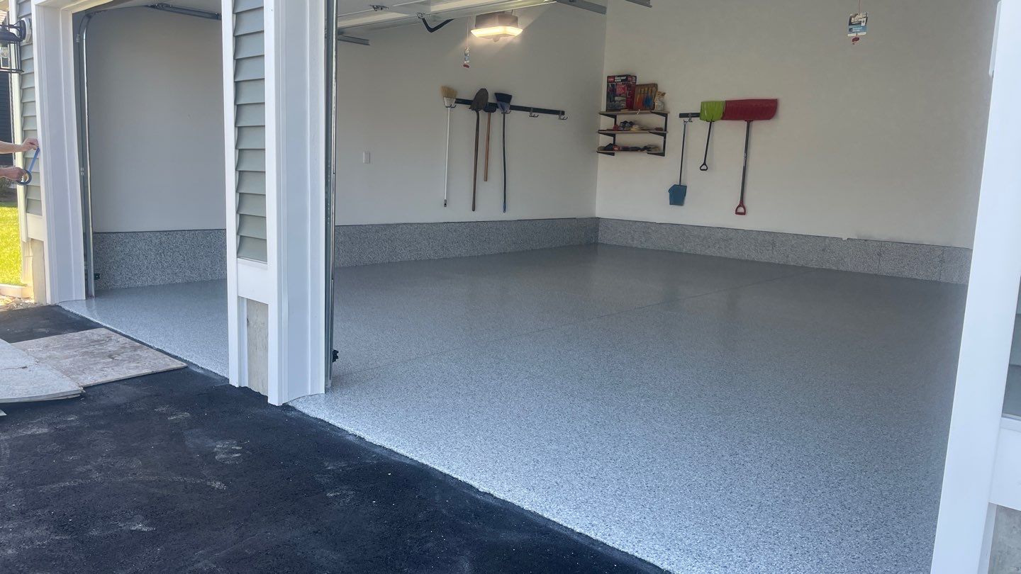 Garage in Londonderry, NH 03053 by Symphony Concrete Coatings