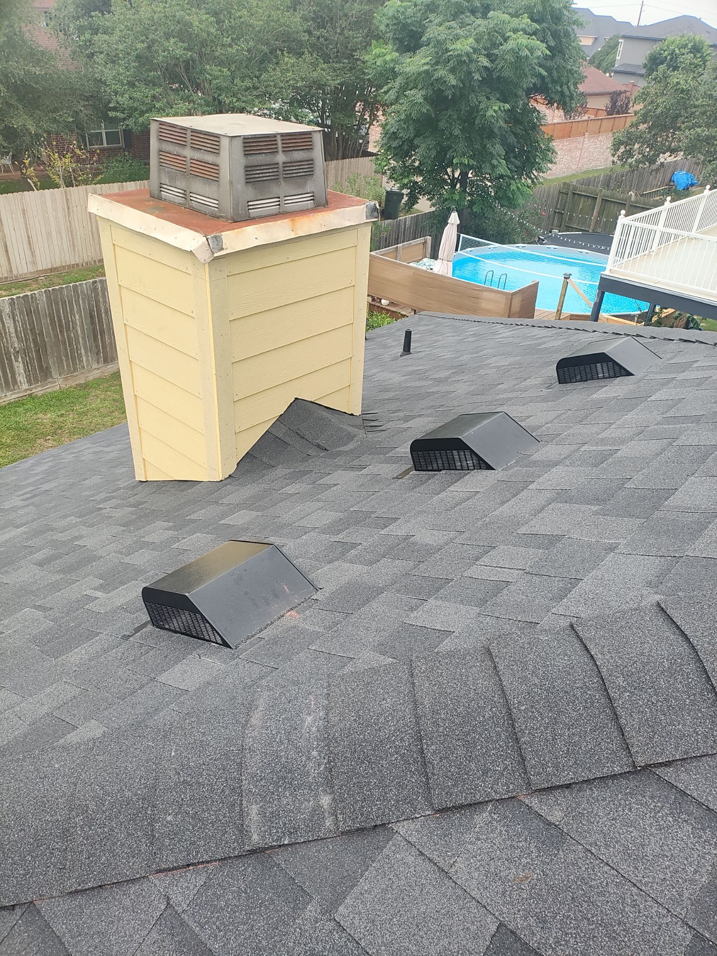 Nothing looks nicer than a little black roof by Bayfront Roofing and Construction