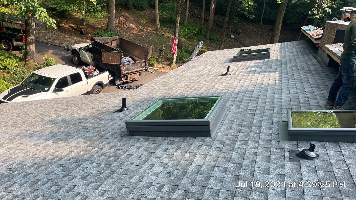Deckhouse Roof Replacement by American Home Contractors