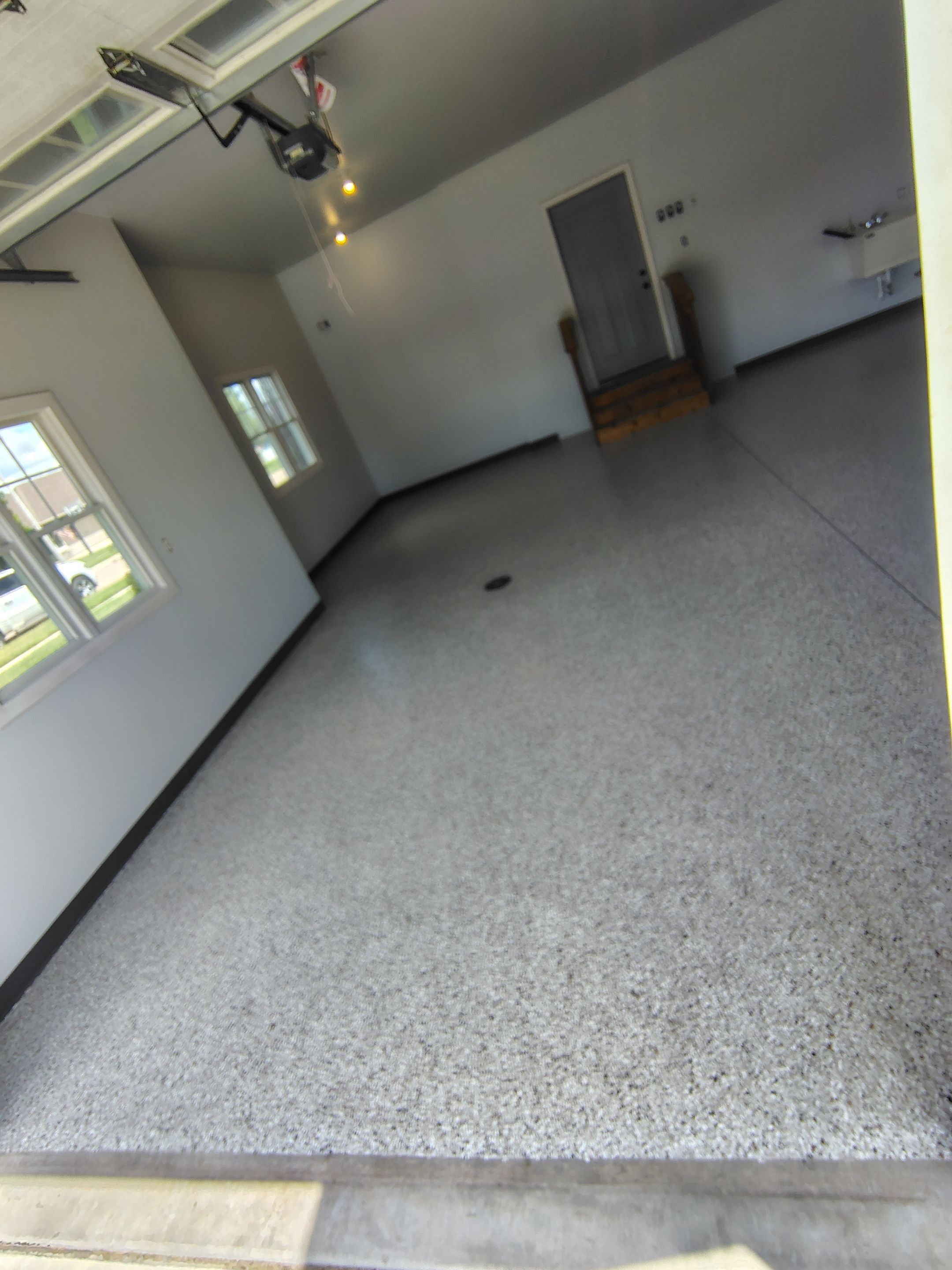 Multi-Car Garage Concrete Coating and Crack Repair in Dell Rapids by Select Painting, Coatings & Garage Cabinets