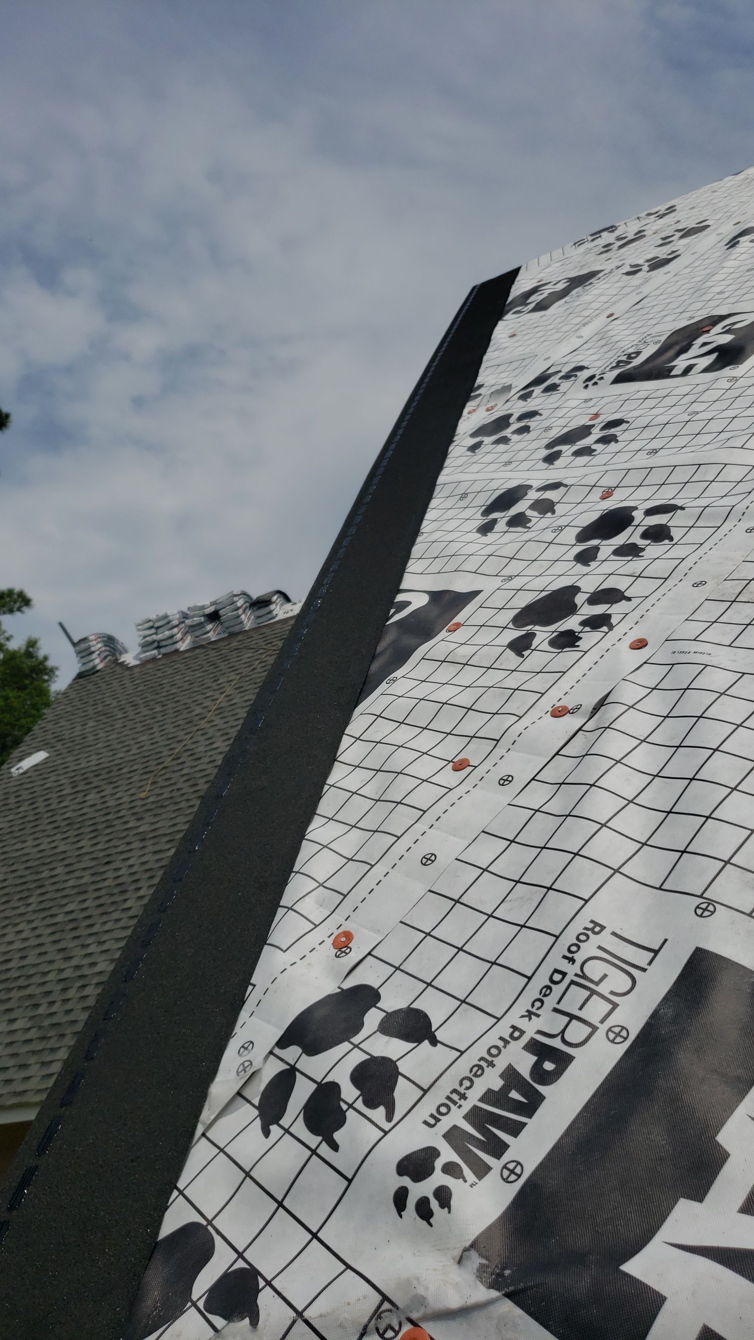 Residential Roofing Installation using Roof Replacement by American Roofing & Construction LLC