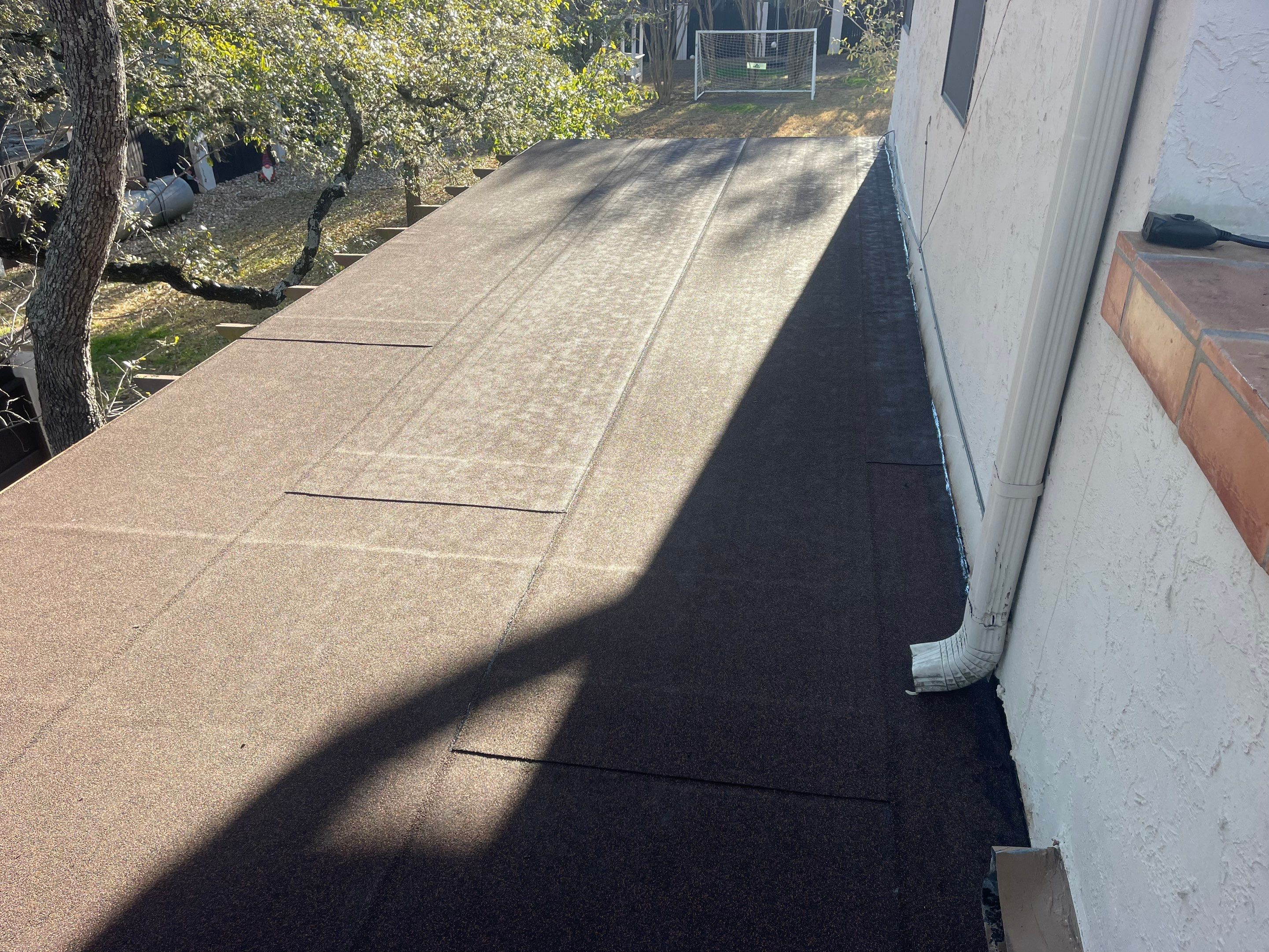 Residential Flat Roof Replacement using Mulehide Modified Bitumen Roofing by Premier Roofing and Contracting