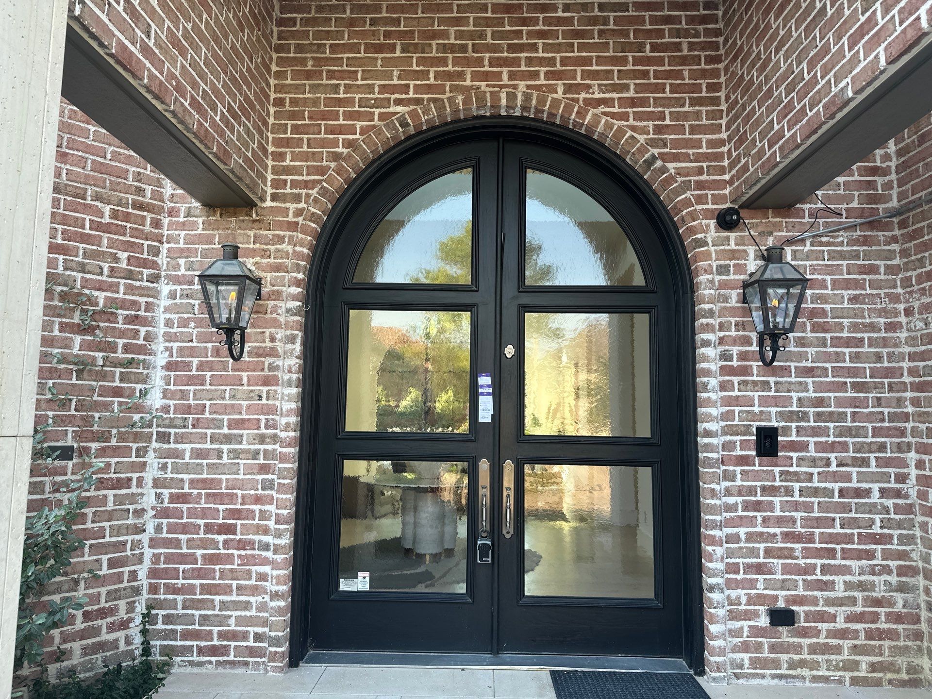 Custom Arched Metal Entry Door Installation in Plano by Solara Custom Living