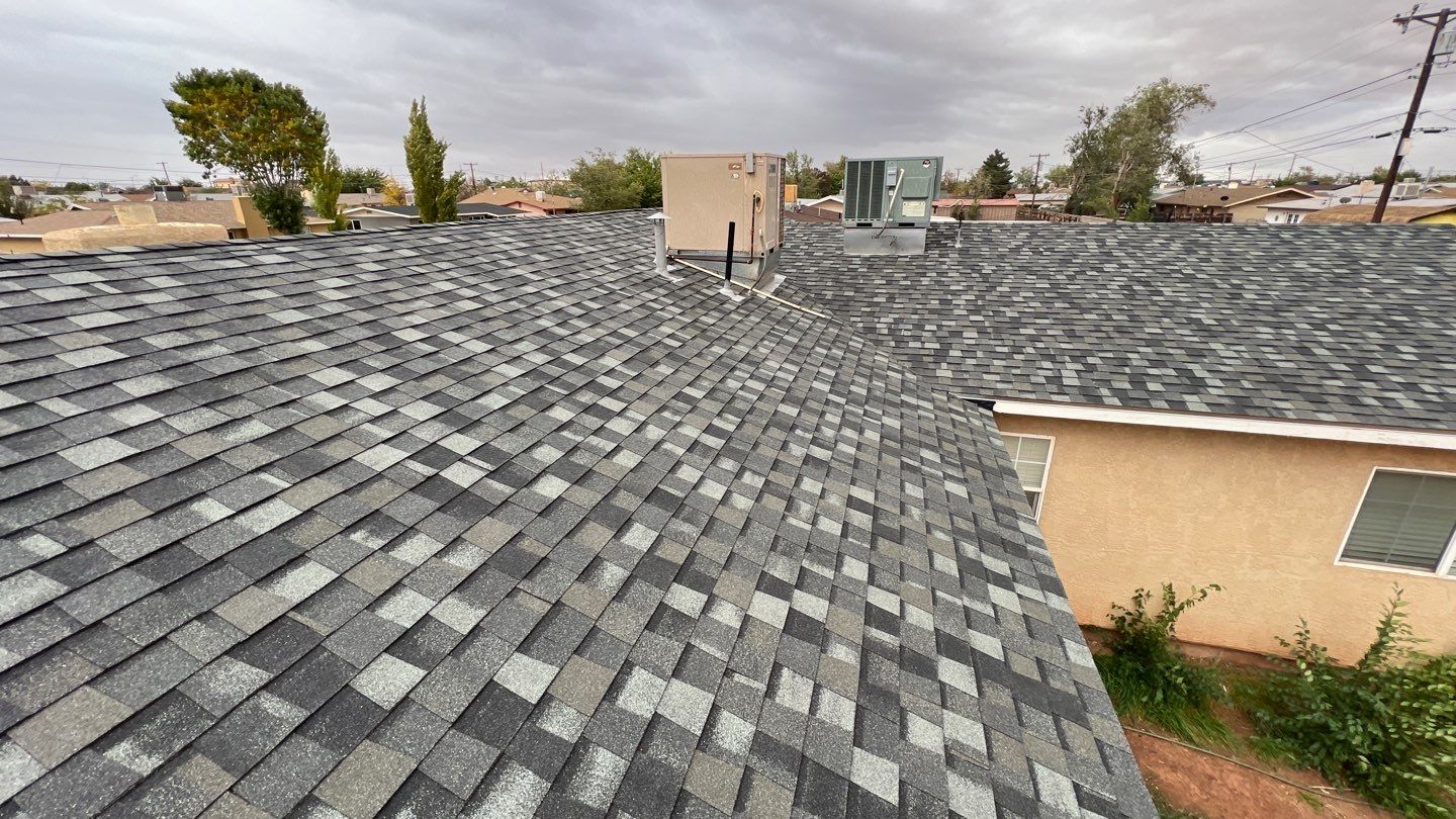 Onyx Black Shingles by Reimagine Roofing