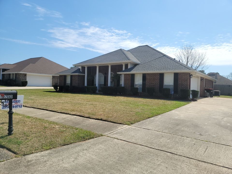 Residential Roofing Installation using Roof Replacement by American Roofing & Construction LLC