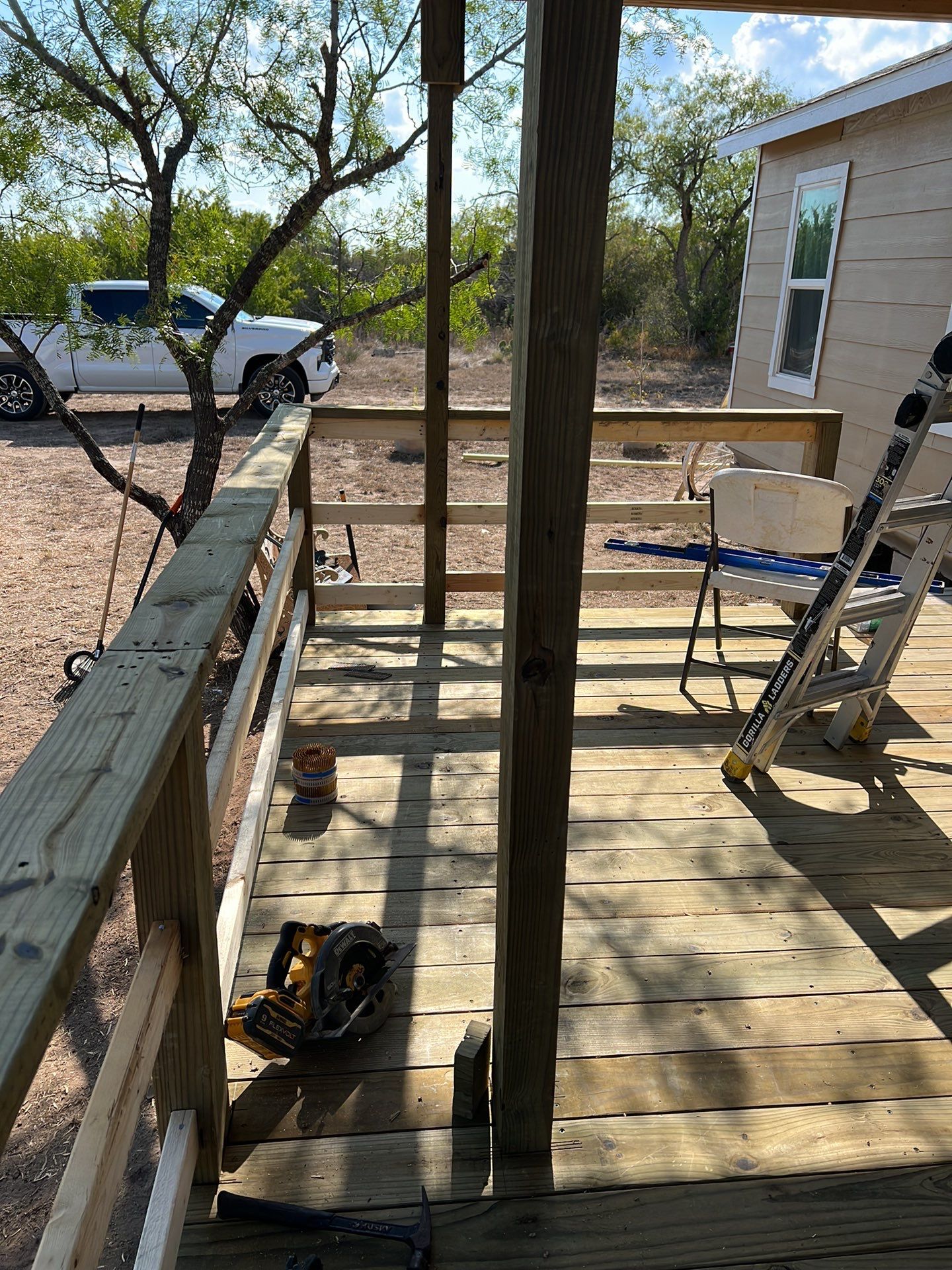 Front Porch Sitt'n by Bayfront Roofing and Construction
