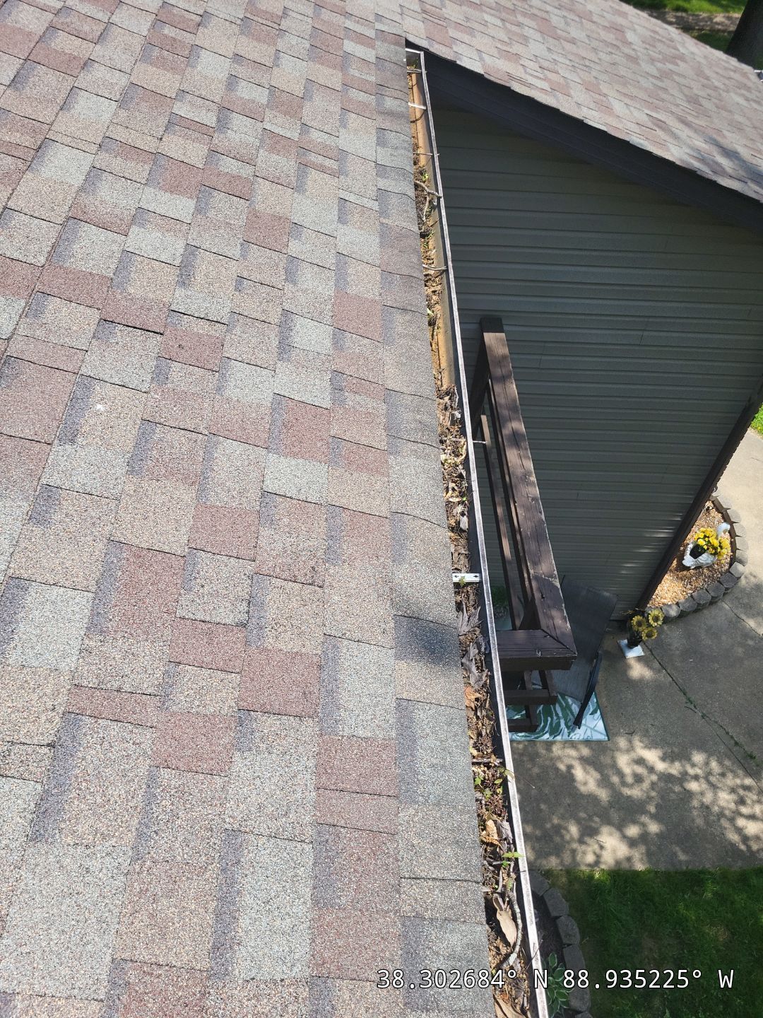 Commercial gutter cleaning Carbondale, IL before photo with filled gutters