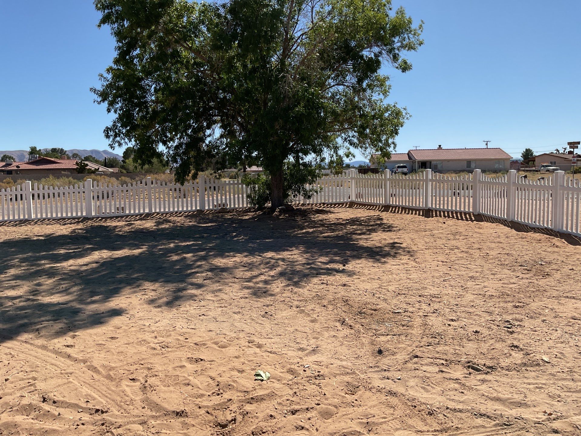 White picket fence  by Fence Guys Inc. 