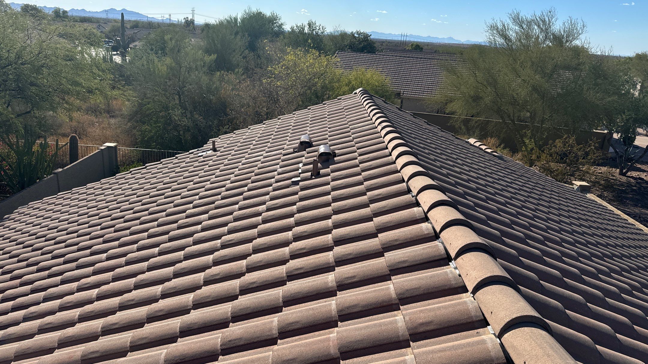 Residential Roofing Installation using Clay Tile by Weather-Tite Exteriors LLC