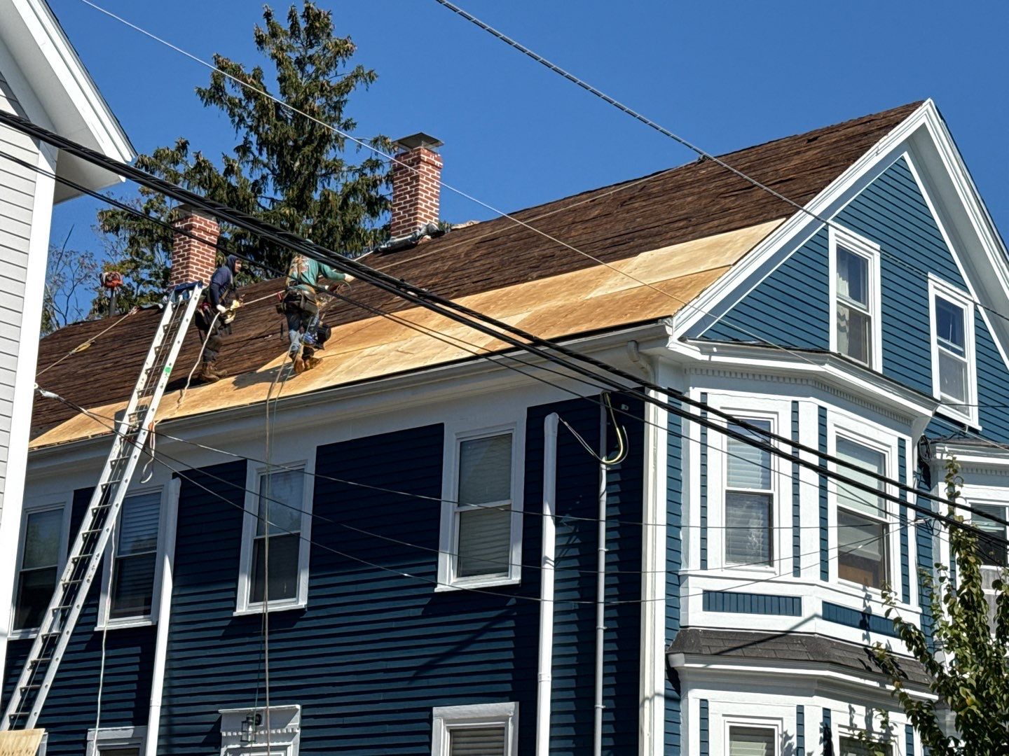 Half Roof Replacement for Solar Installation – Townhouse with New Plywood Decking by Sensible Home Solutions