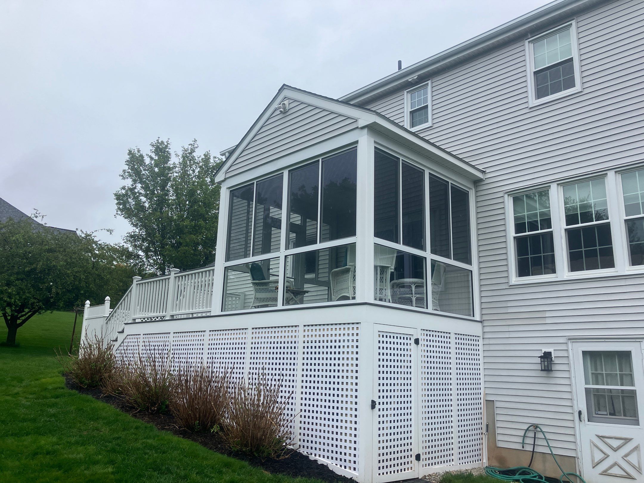 Summer Space Porch Enclosure Transformation by DiGiorgi Roofing and Siding Inc